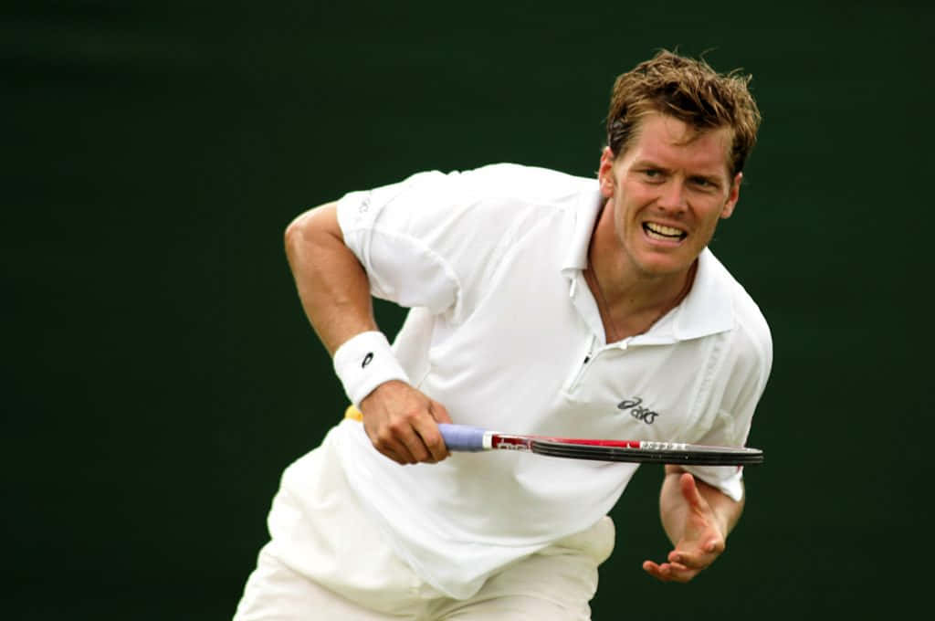 Tennis Player Thomas Enqvist Green Background Wallpaper