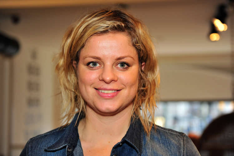 Kim Clijsters in Action on the Tennis Court Wallpaper