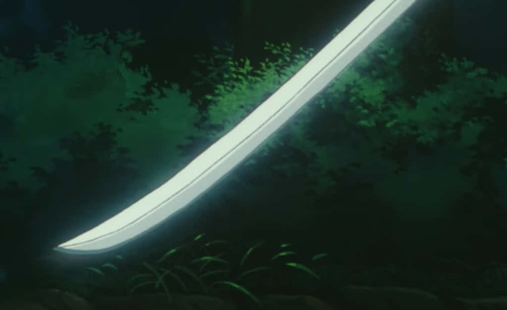 The Legendary Tenseiga Sword in Action Wallpaper
