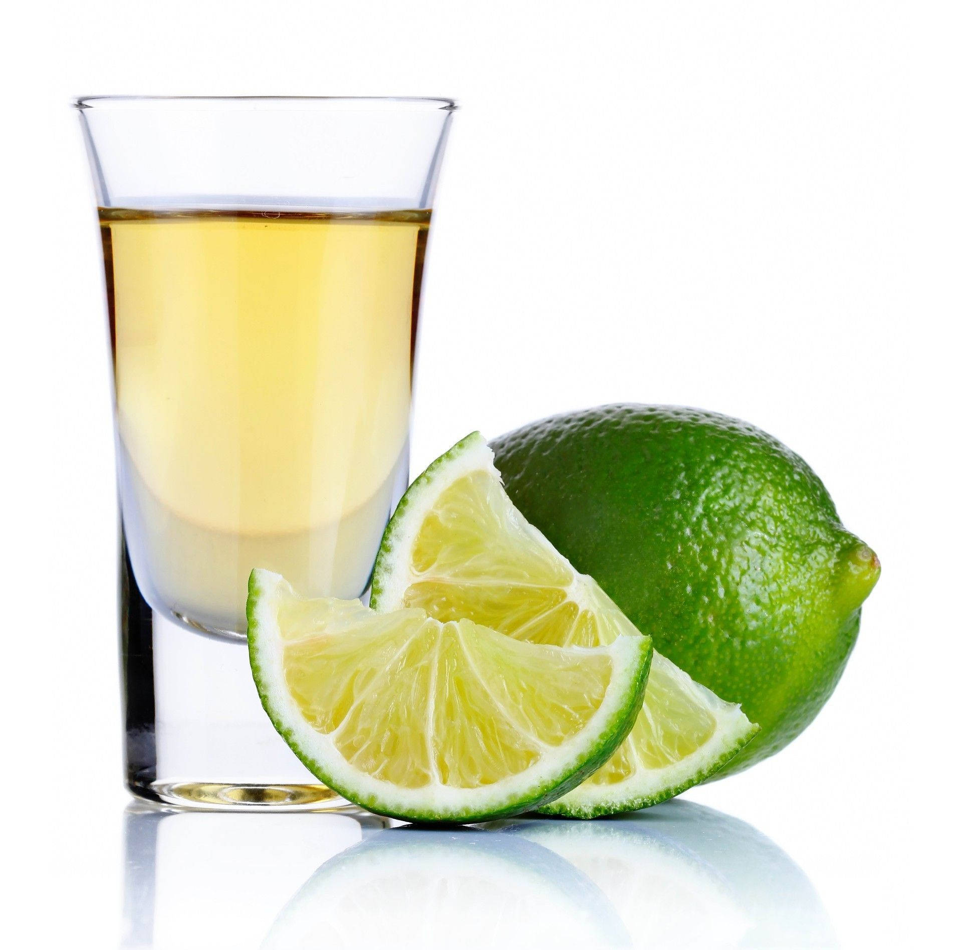 Tequila Shot With Fresh Lime Slices Wallpaper