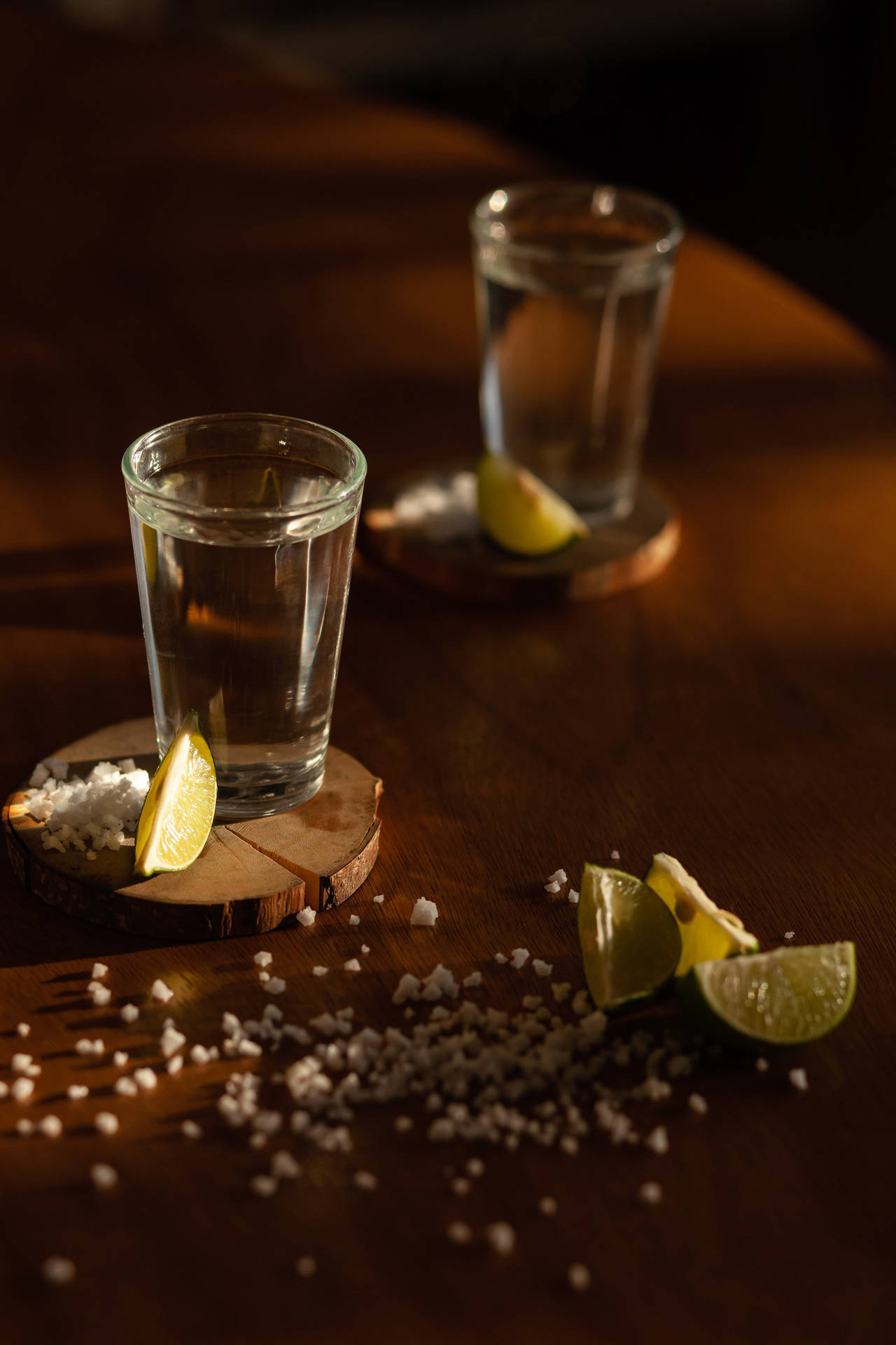 Deliziosebevute Di Tequila Servite Con Limone E Sale Sfondo