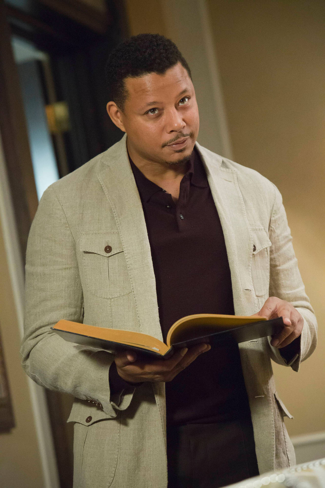 Terrence Howard In Empire Series With A Book Wallpaper