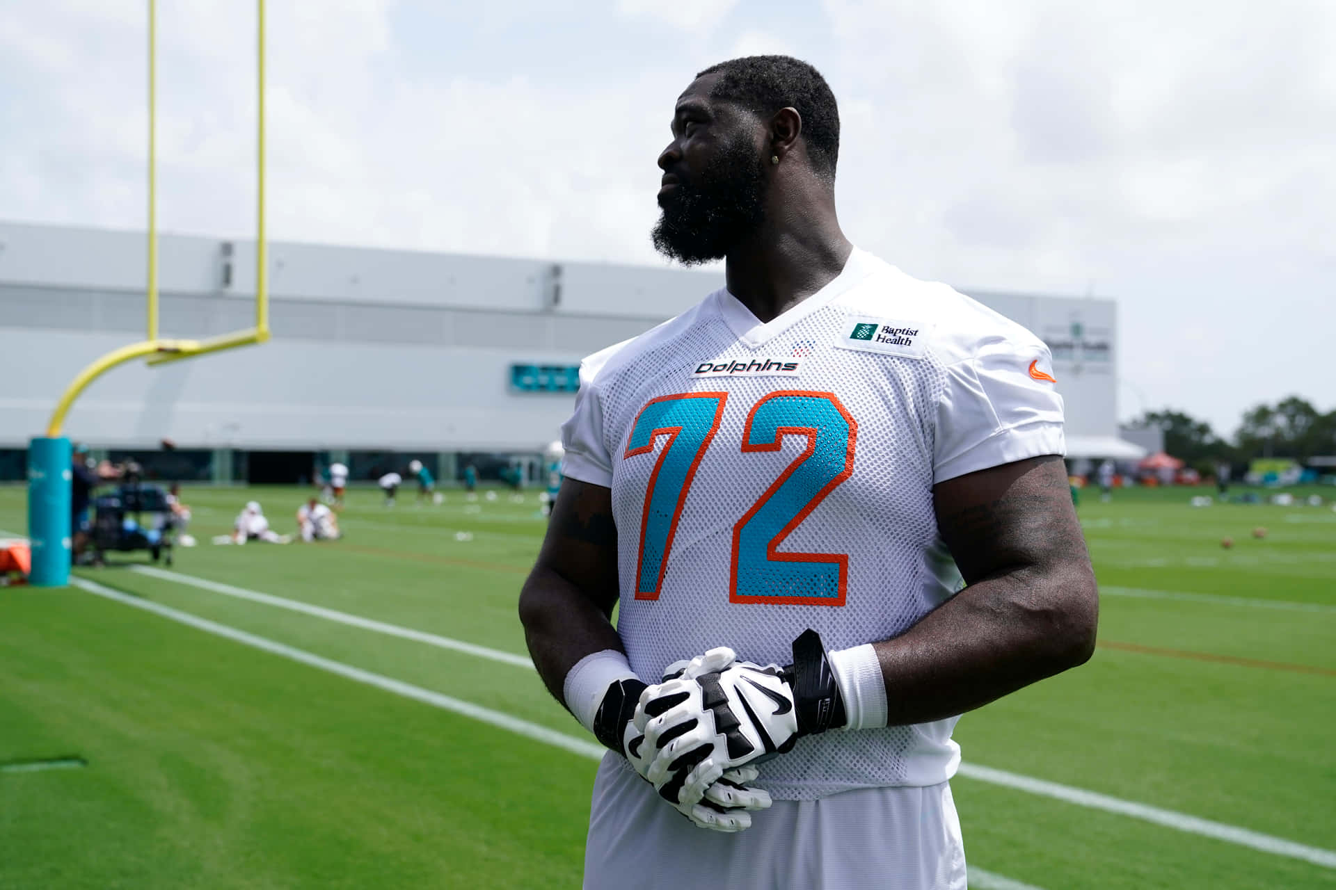 Terron Armstead Miami Dolphins synes at have øvelsesdragter Wallpaper