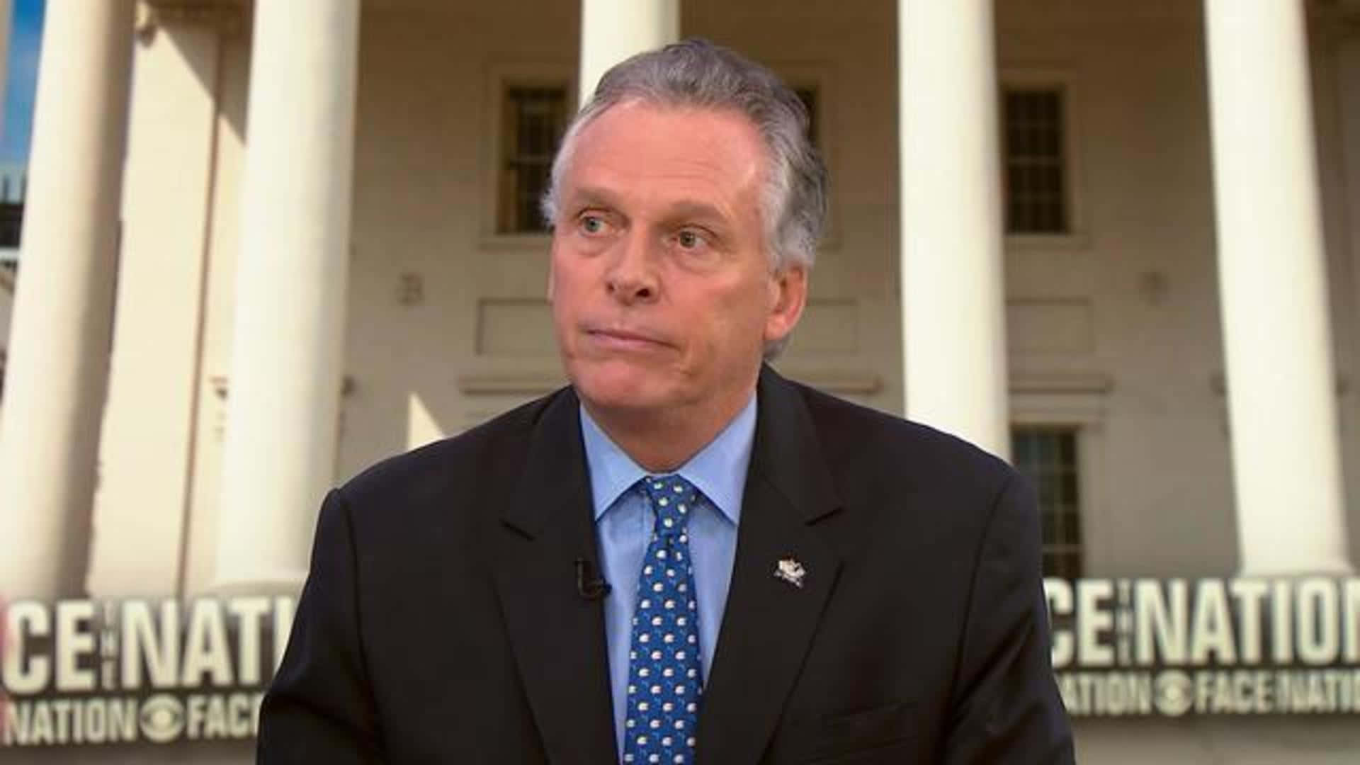 Terry McAuliffe Standing in Front of The White House Wallpaper
