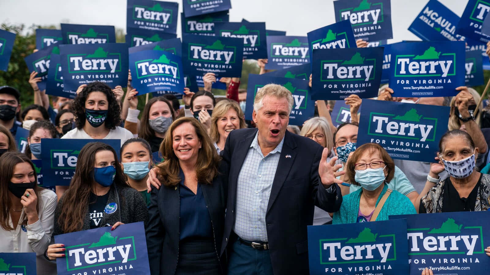 Terry Mcauliffe With His Supporters Wallpaper