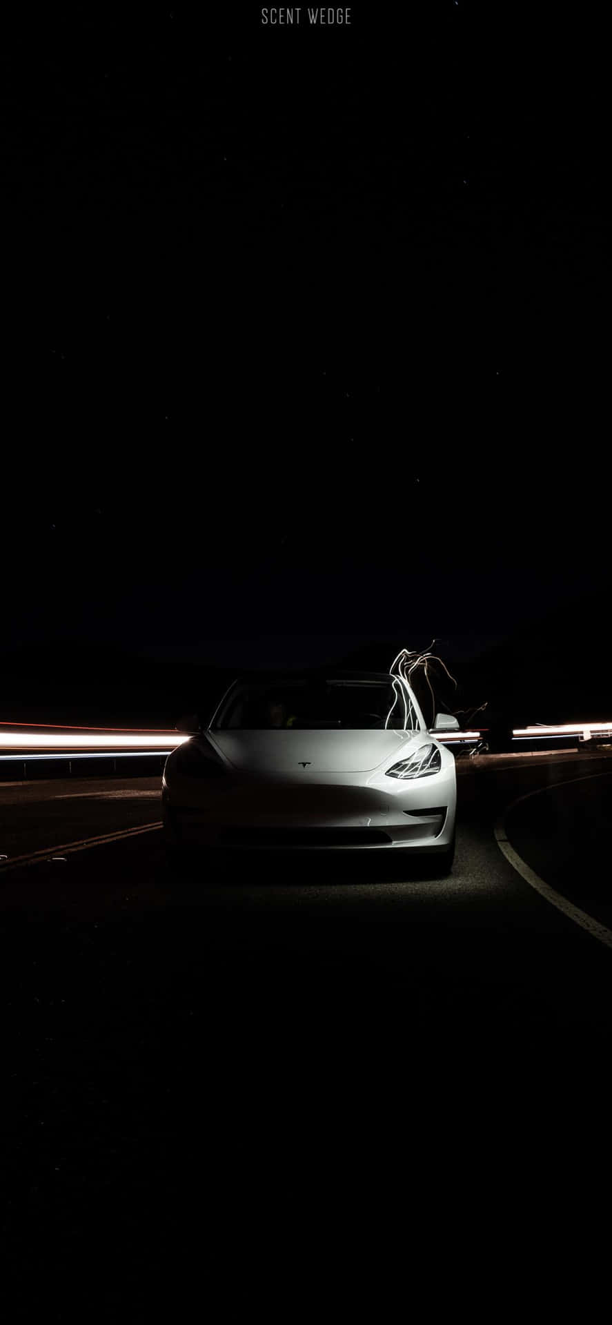Unlock the power of your #Tesla with the iPhone Wallpaper