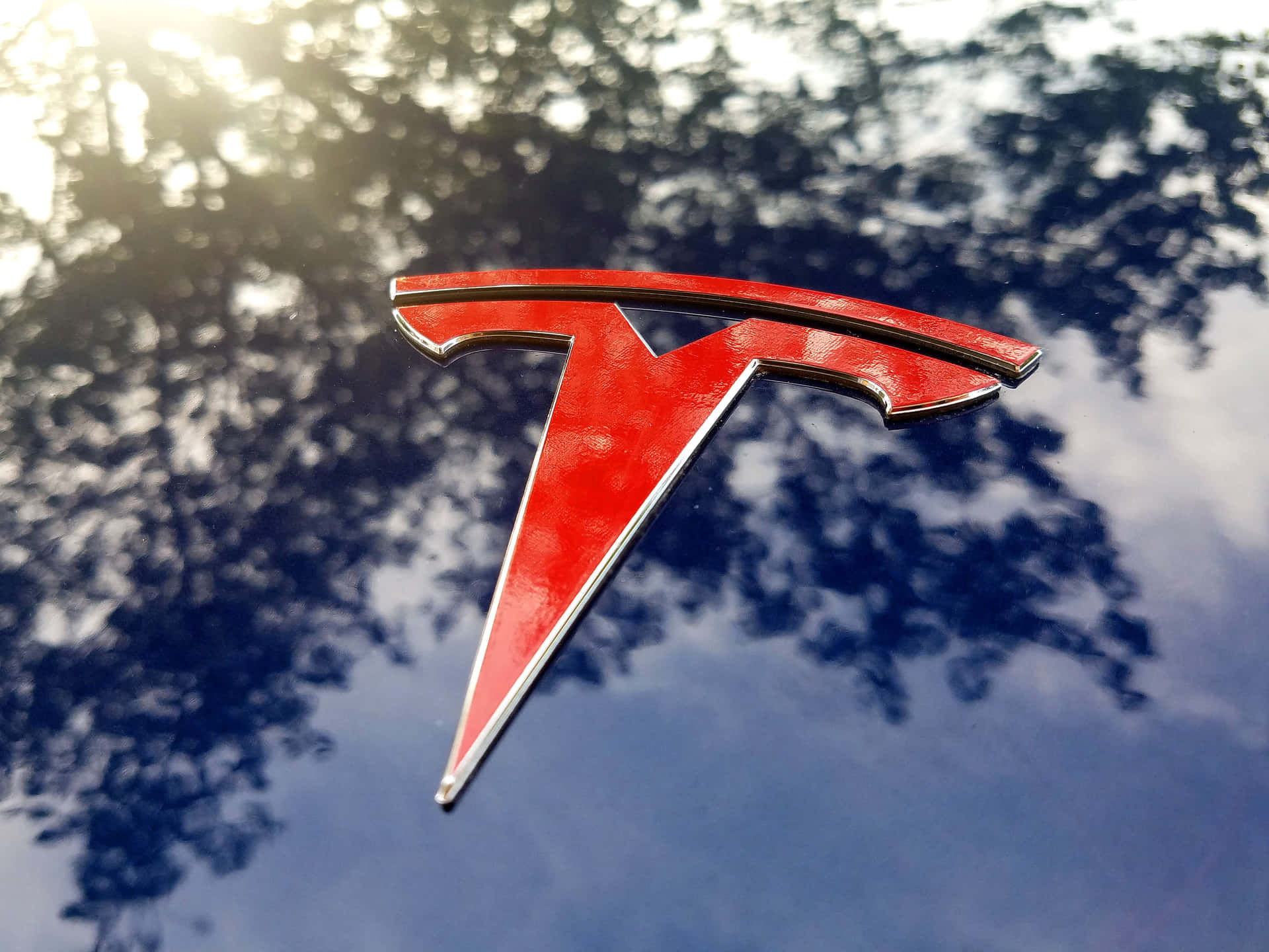 Tesla Logo in High Resolution Wallpaper