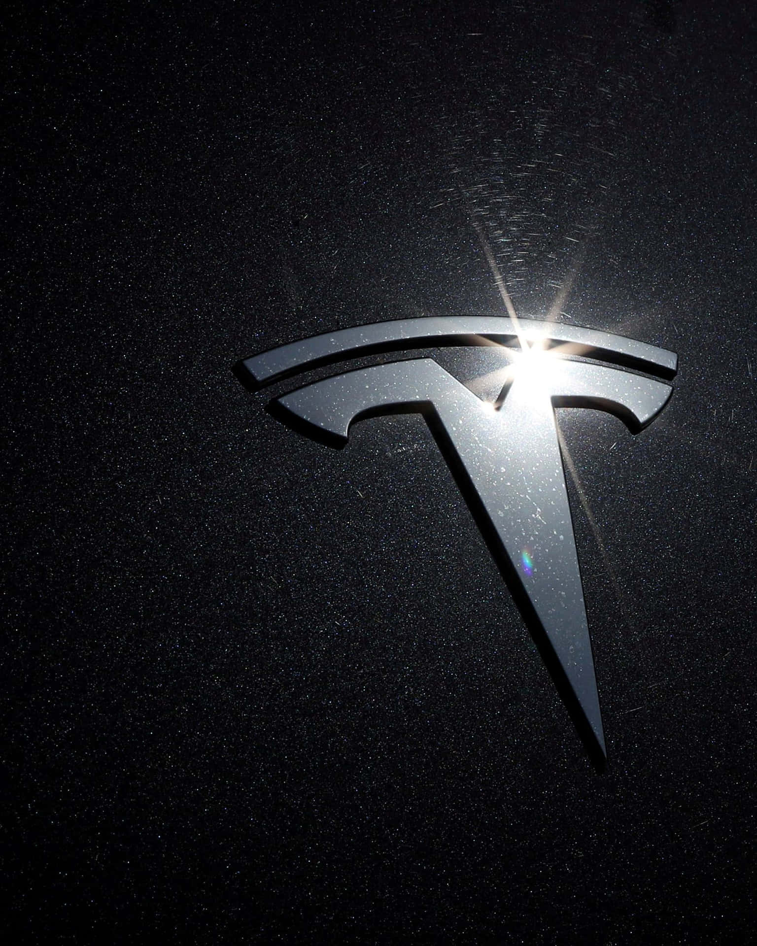 Metallic Silver Tesla Logo Wallpaper