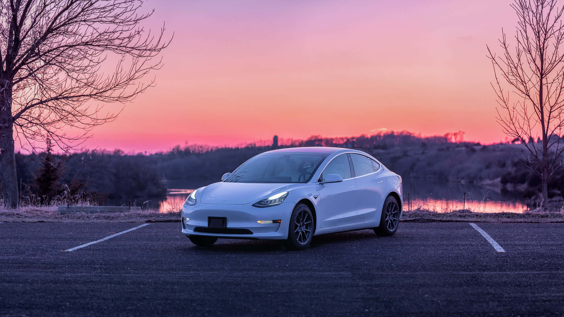 Tesla Model 3 At Sunset