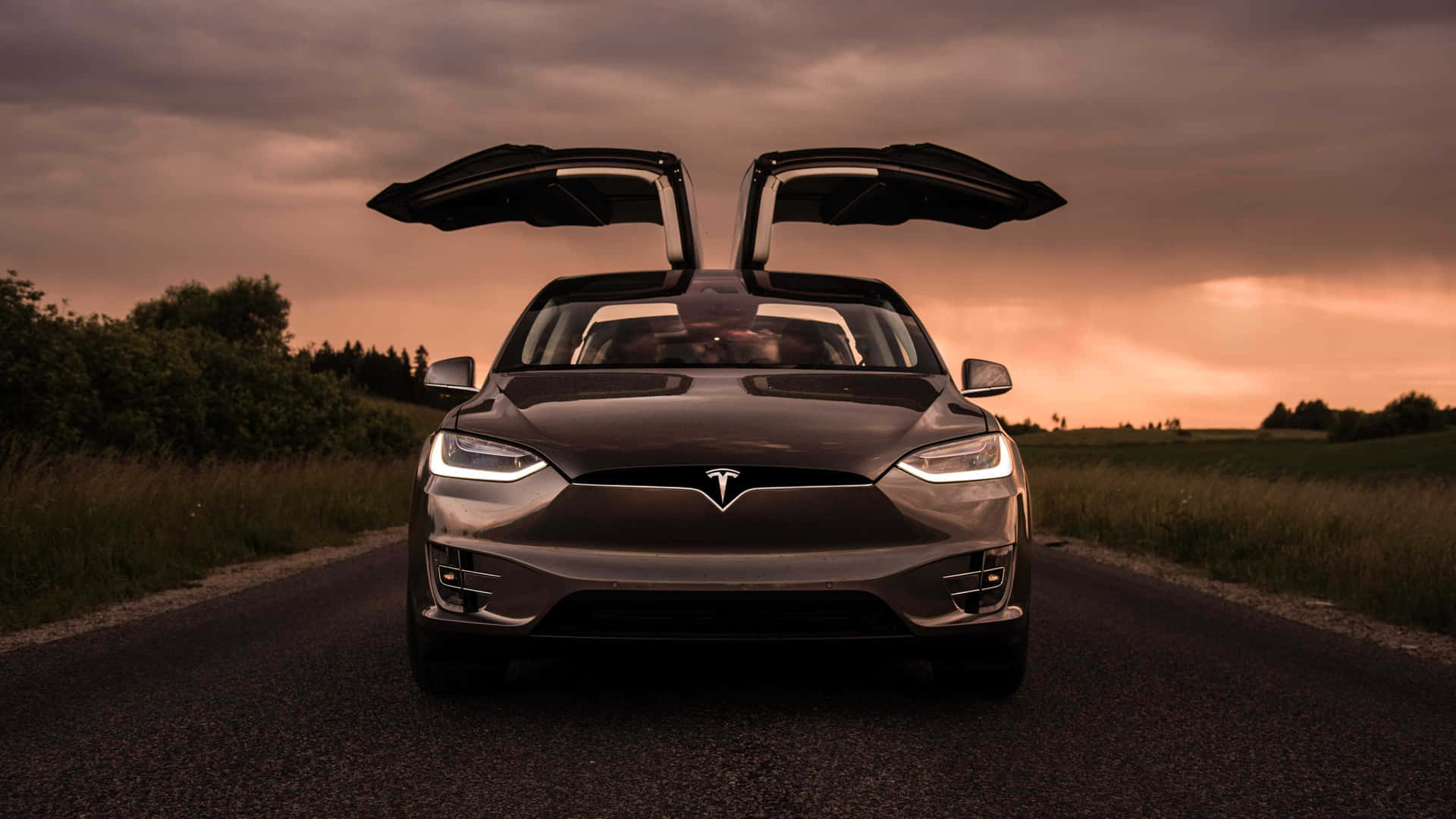 Immaginedi Tesla E Tramonto