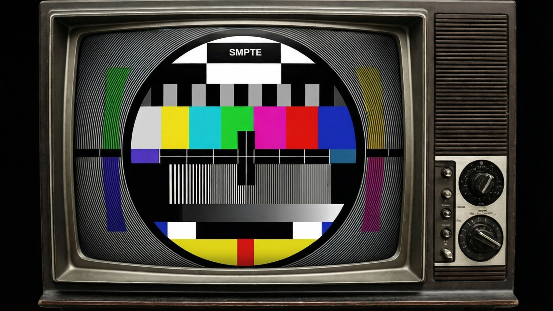 Gammal tv som visar SMPTE-färgstaplar för kalibrering.