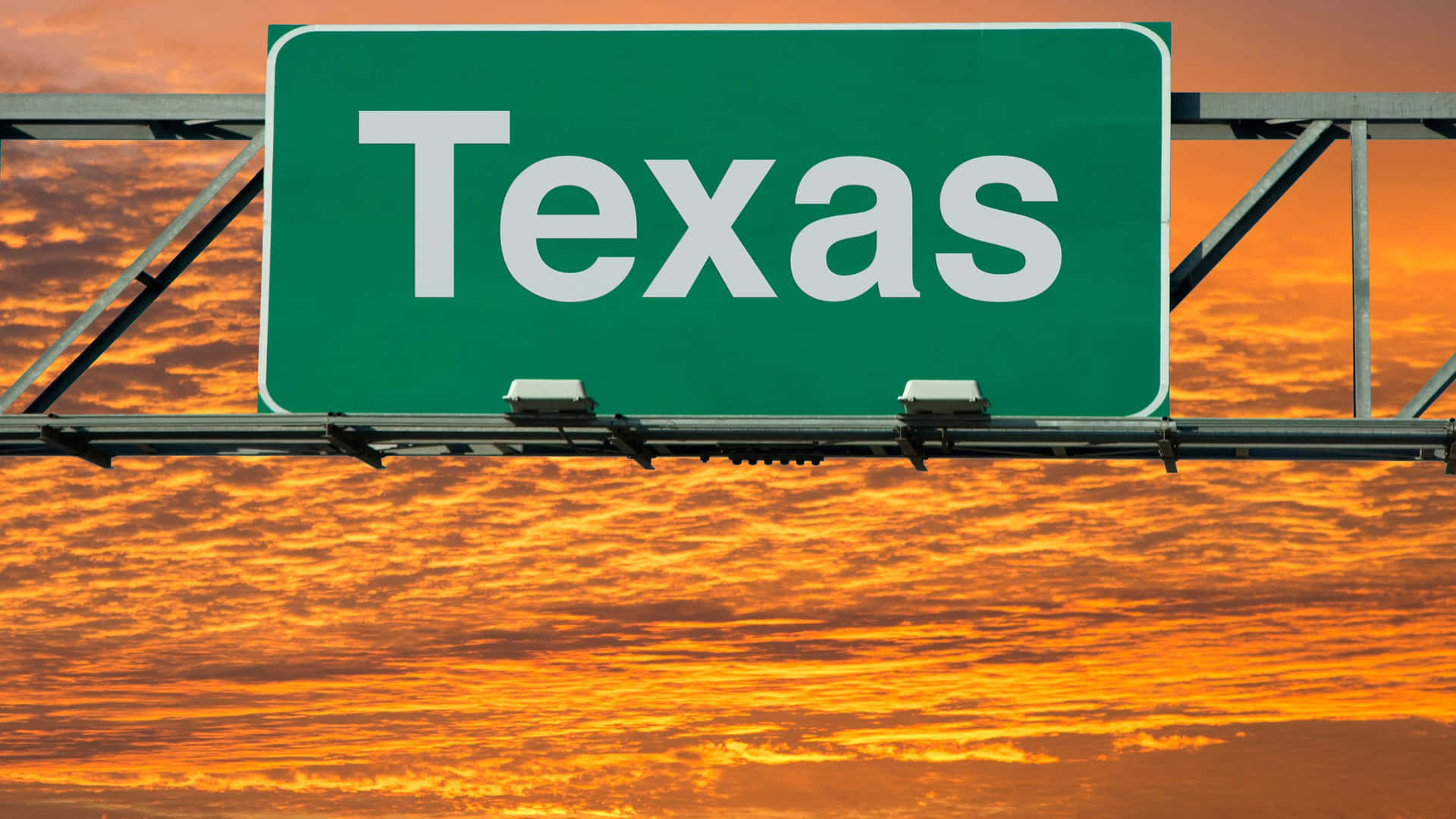 A Green Sign With Texas On It