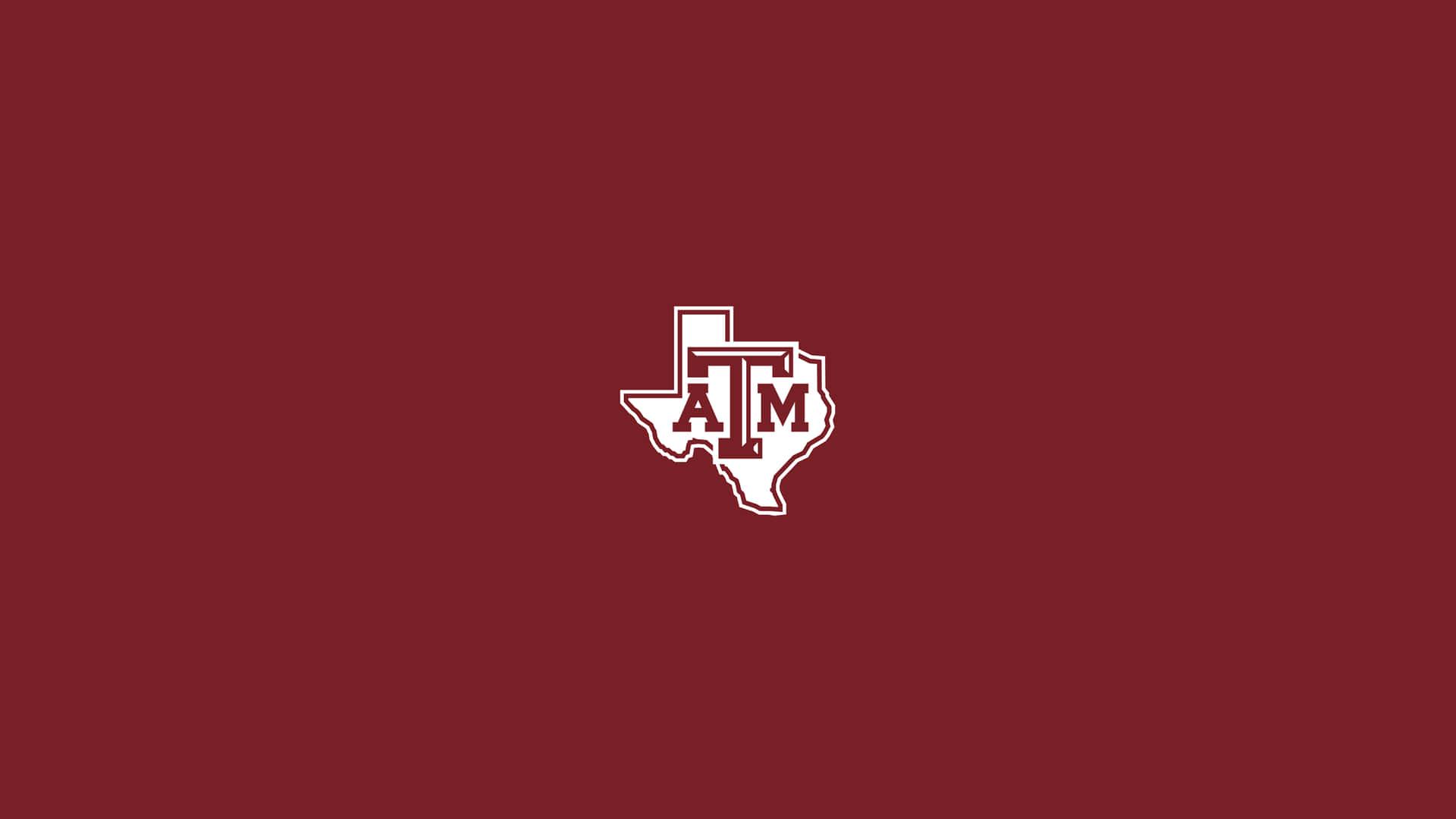 A Maroon Background With The Texas A&m Logo Wallpaper