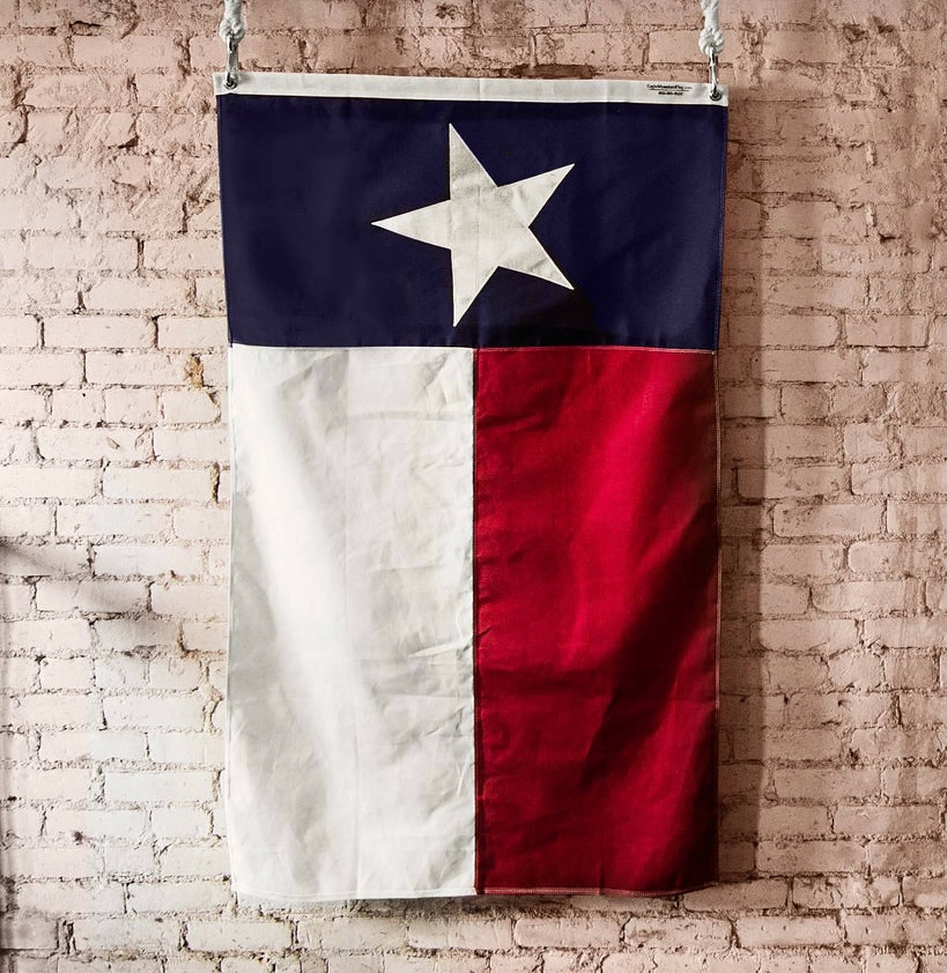 Texas Flag On Brick Wall Wallpaper