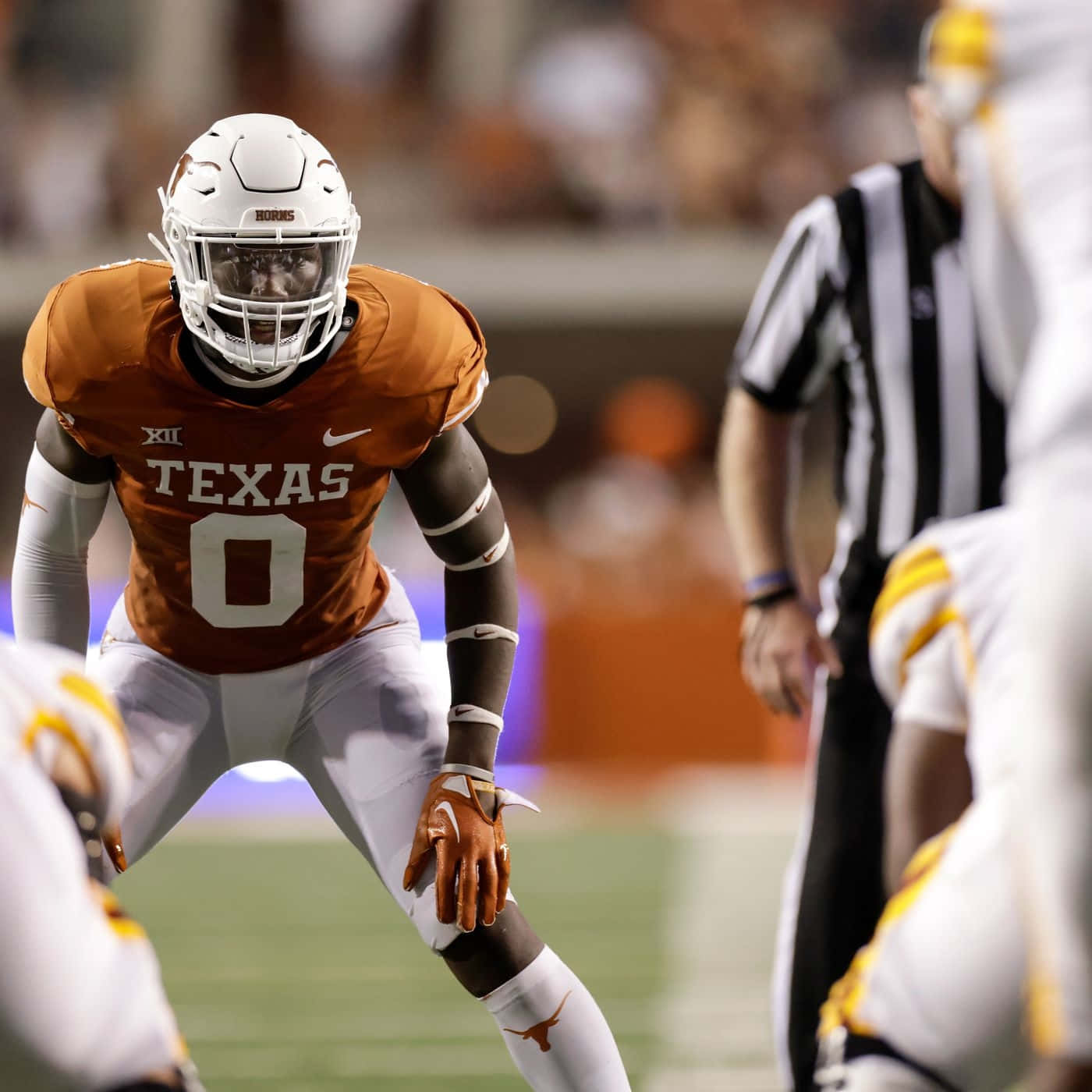 Texas Football Player Ready For Action Wallpaper