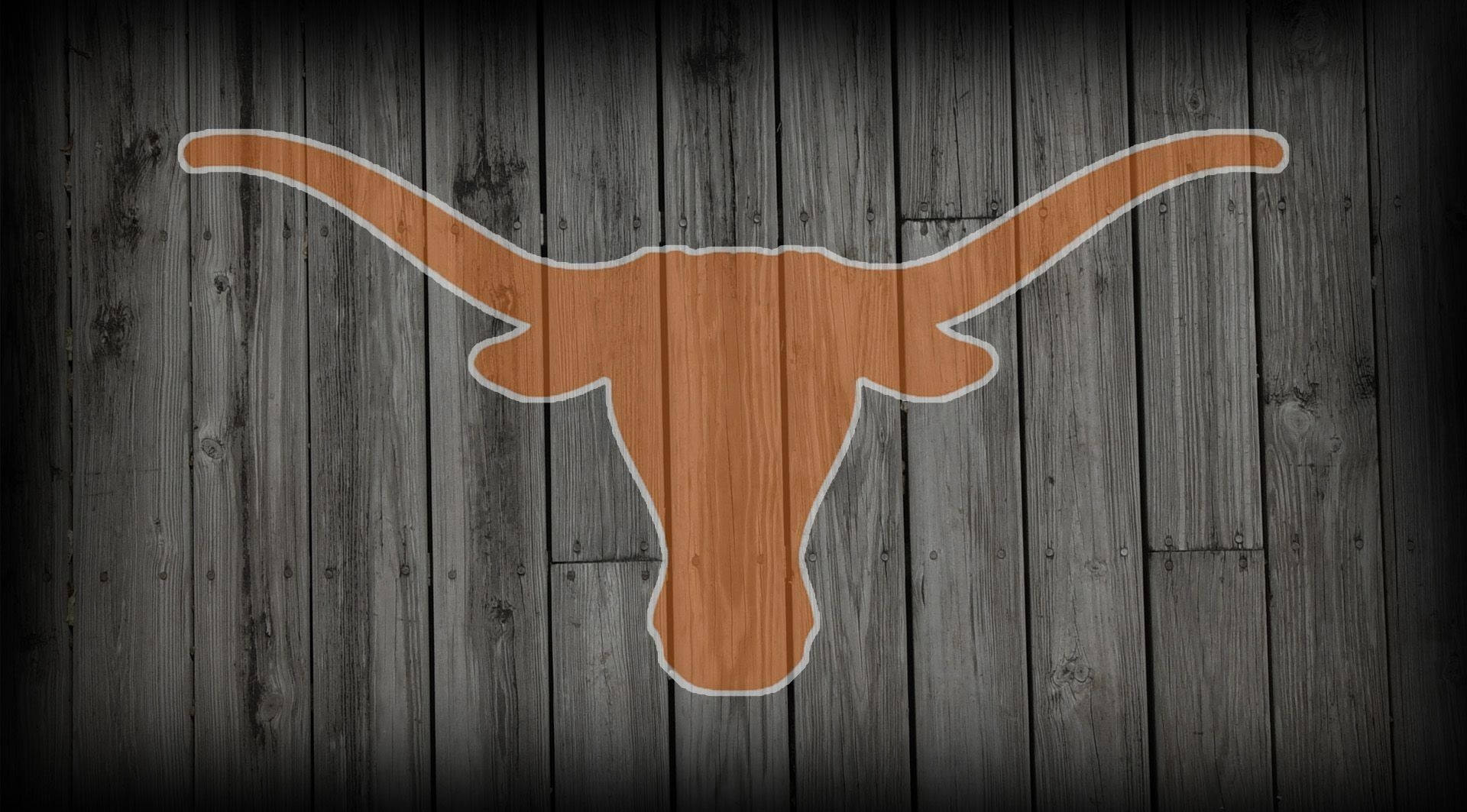 Fondode Pantalla De Madera Con El Logotipo De Los Texas Longhorns. Fondo de pantalla