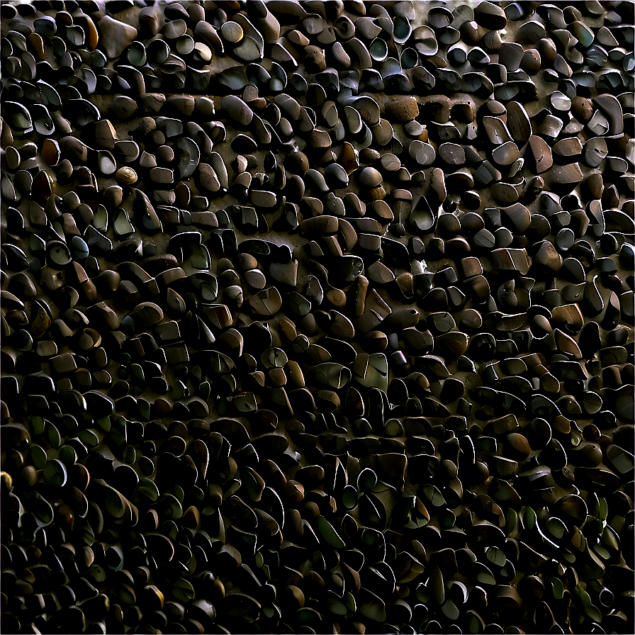 Close-up van donkere glanzende kiezelstenen gerangschikt in een dicht gestructureerd patroon