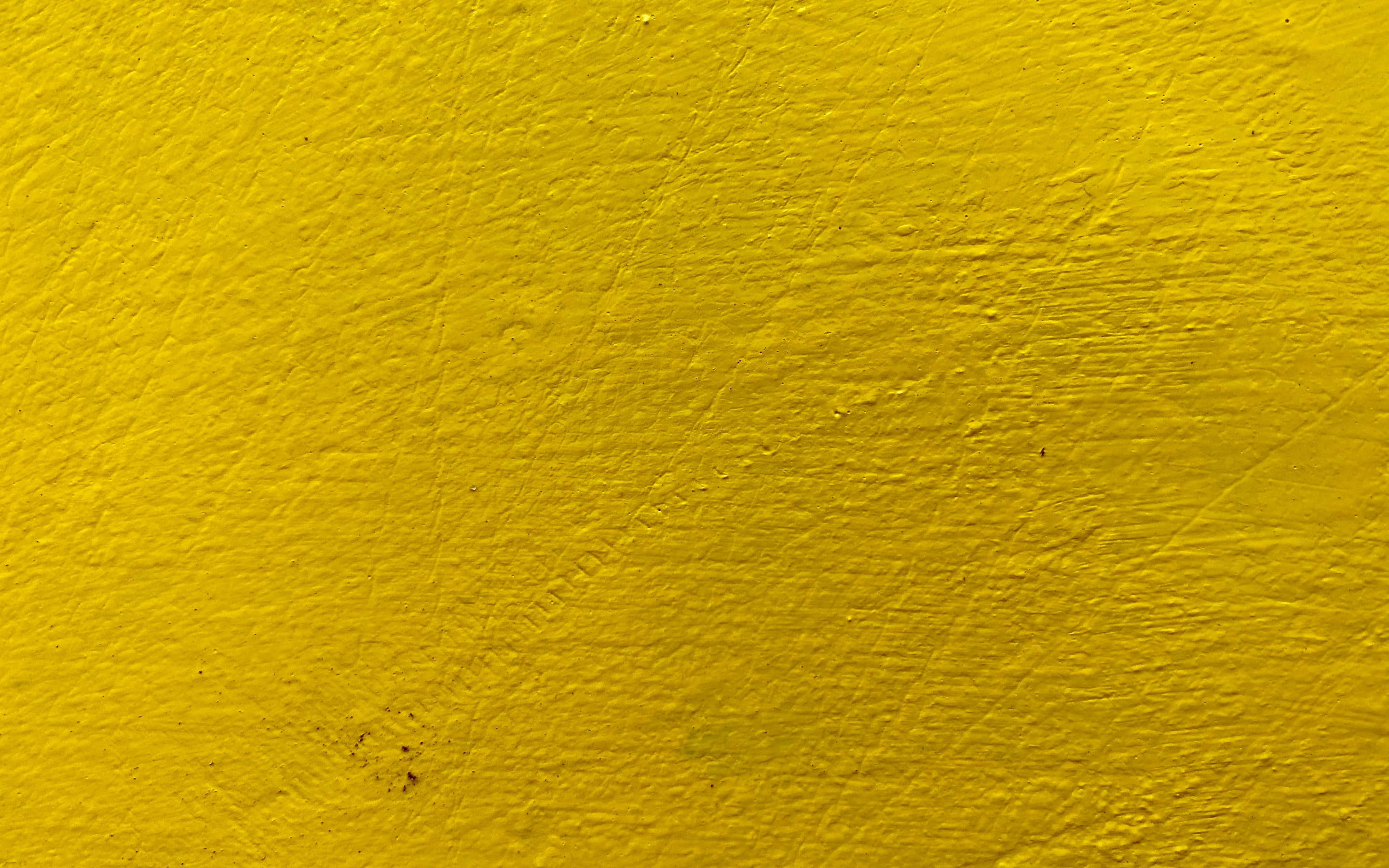 Textured Bright Yellow Stone Wall Wallpaper