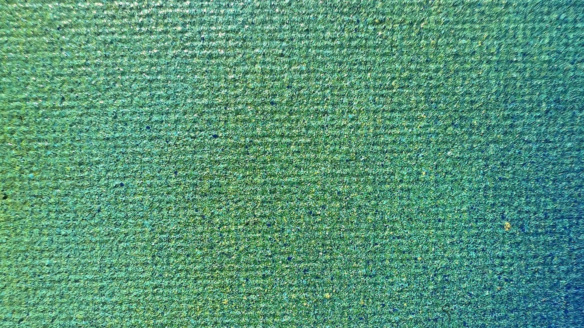 Textured Green Surface Background Wallpaper