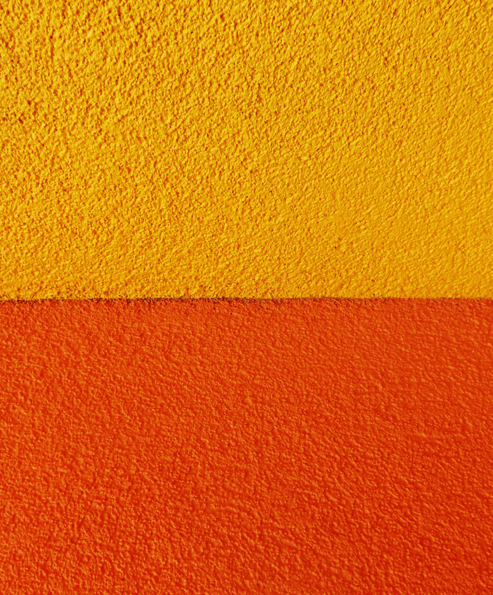 Strukturiertesorange Und Gelbes Beton Wallpaper