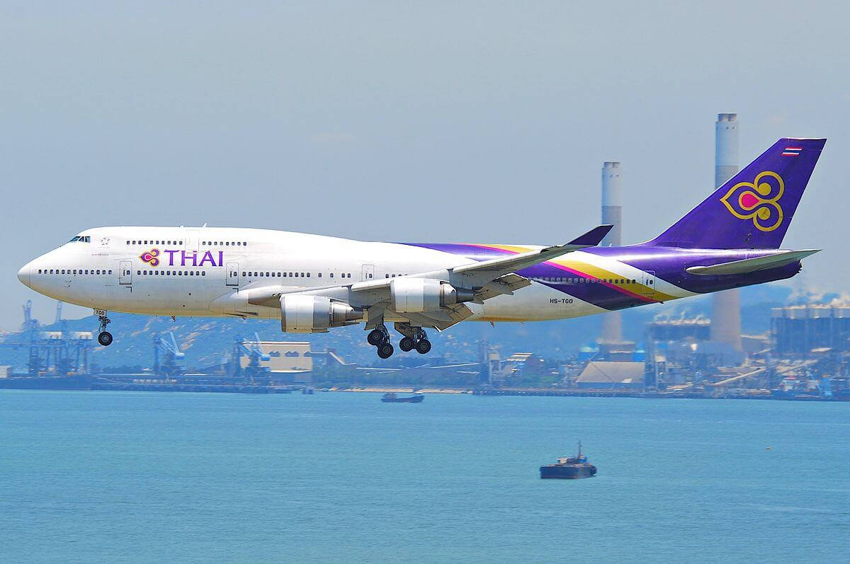 Download Thai Airways Airplane Above The Ocean Wallpaper 