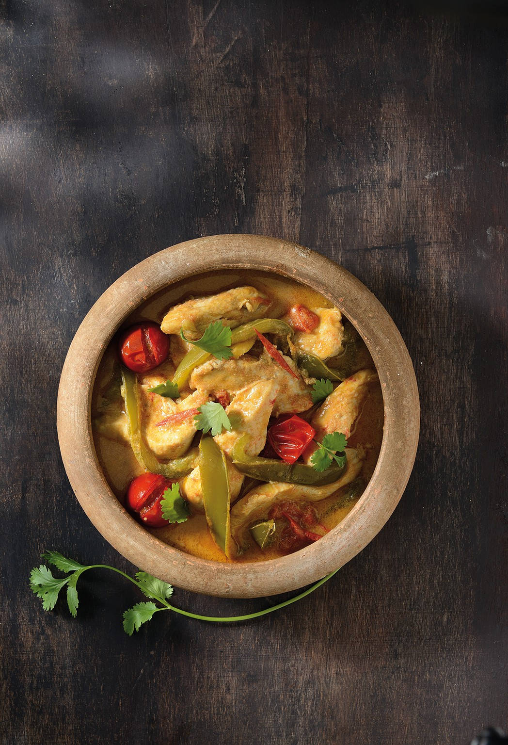 Thai Curry In Clay Pot Top Angle Shot Wallpaper