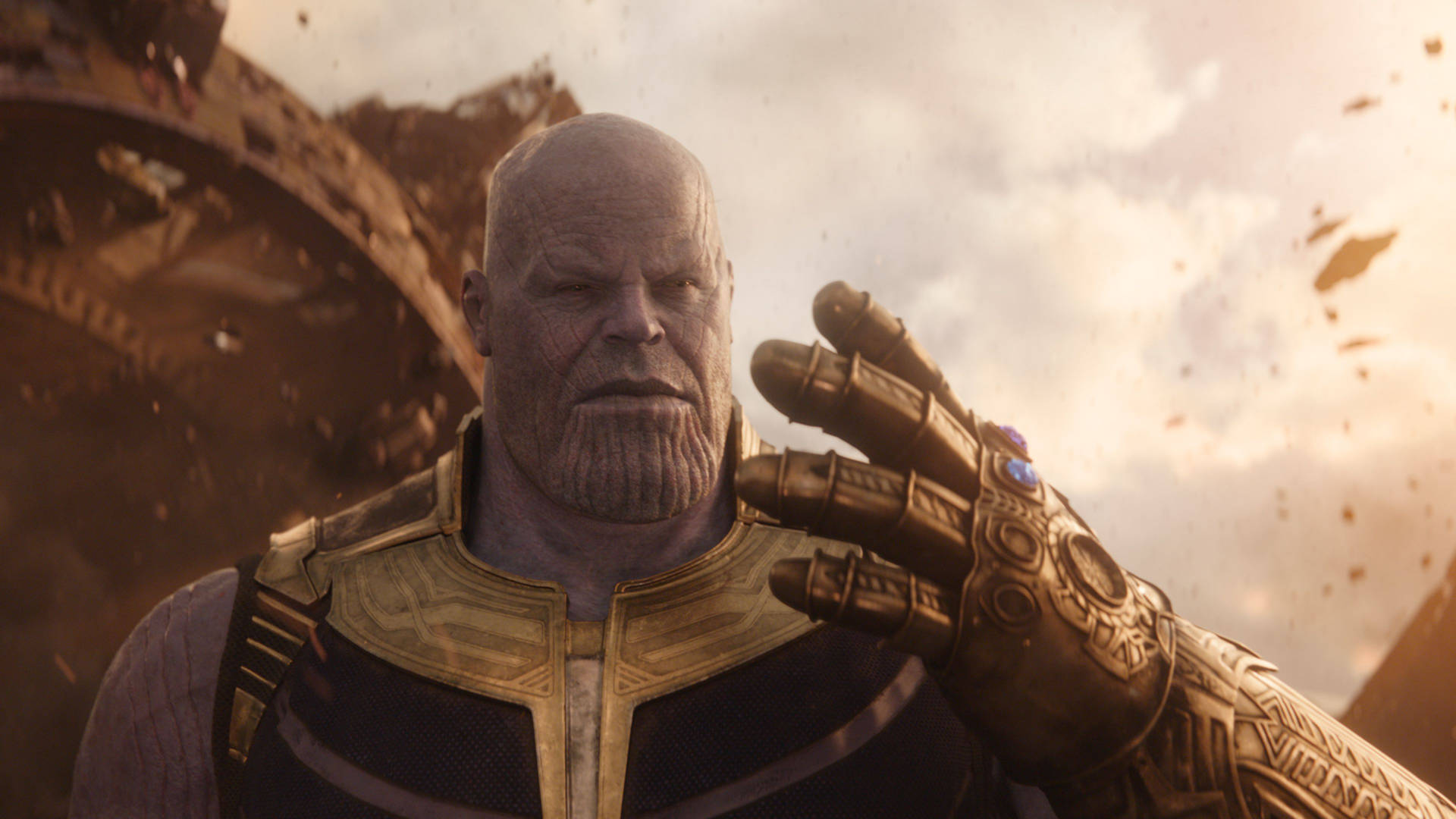 The Mad Titan Thanos Wielding the Infinity Gauntlet Wallpaper