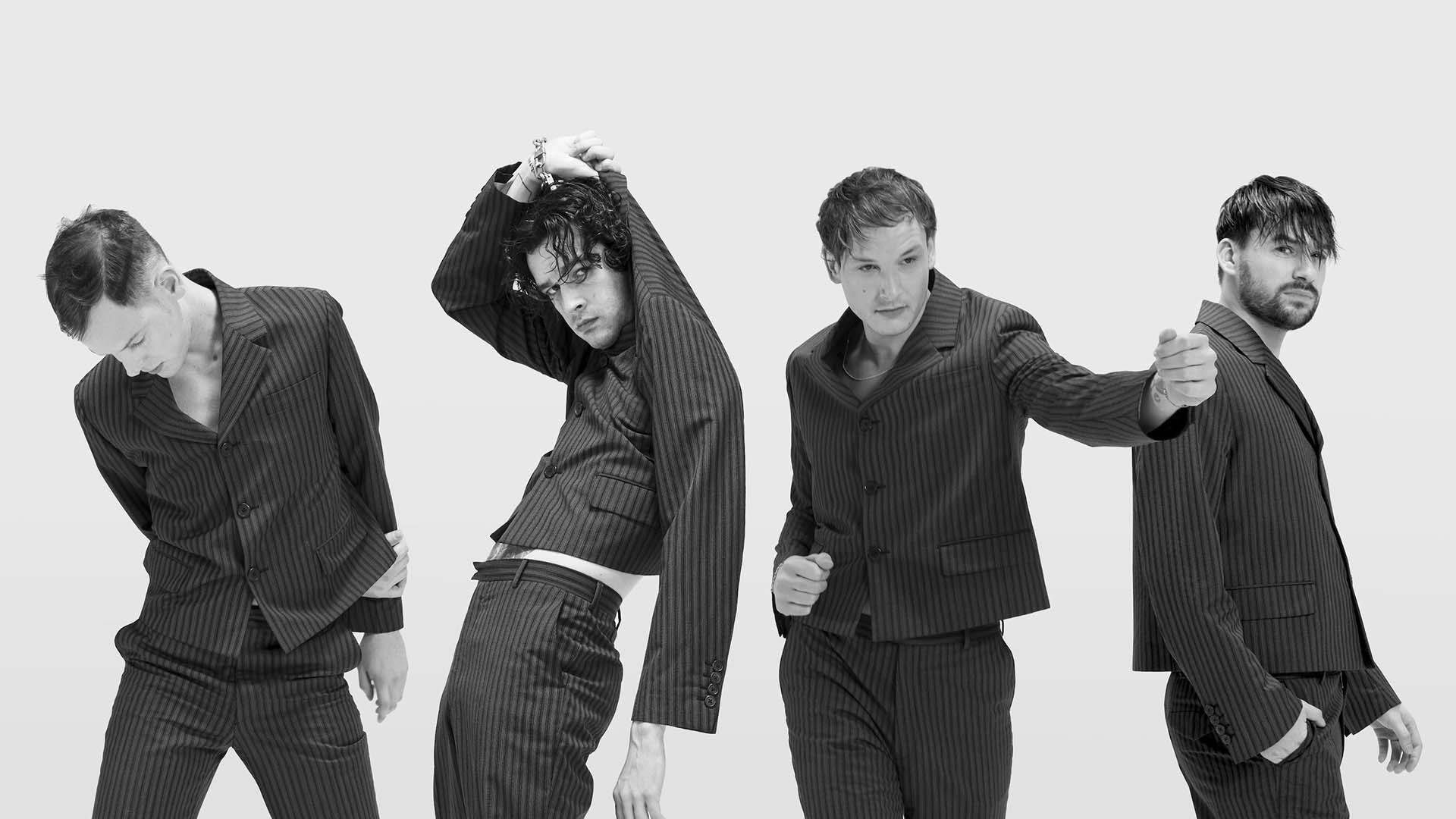The 1975 In Stripe Formal Suits Wallpaper