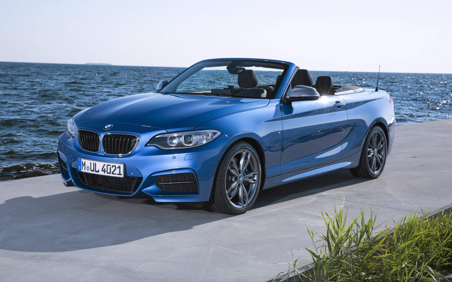 The 2023 Bmw M4 Luxury Sports Car Showcasing Its Sleek Design And Muscular Stance. Wallpaper