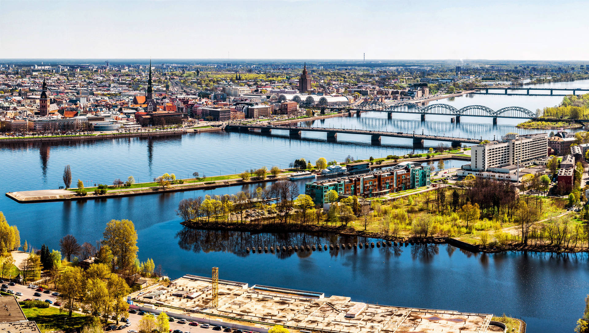 The Beautiful Daugava River In Riga Wallpaper
