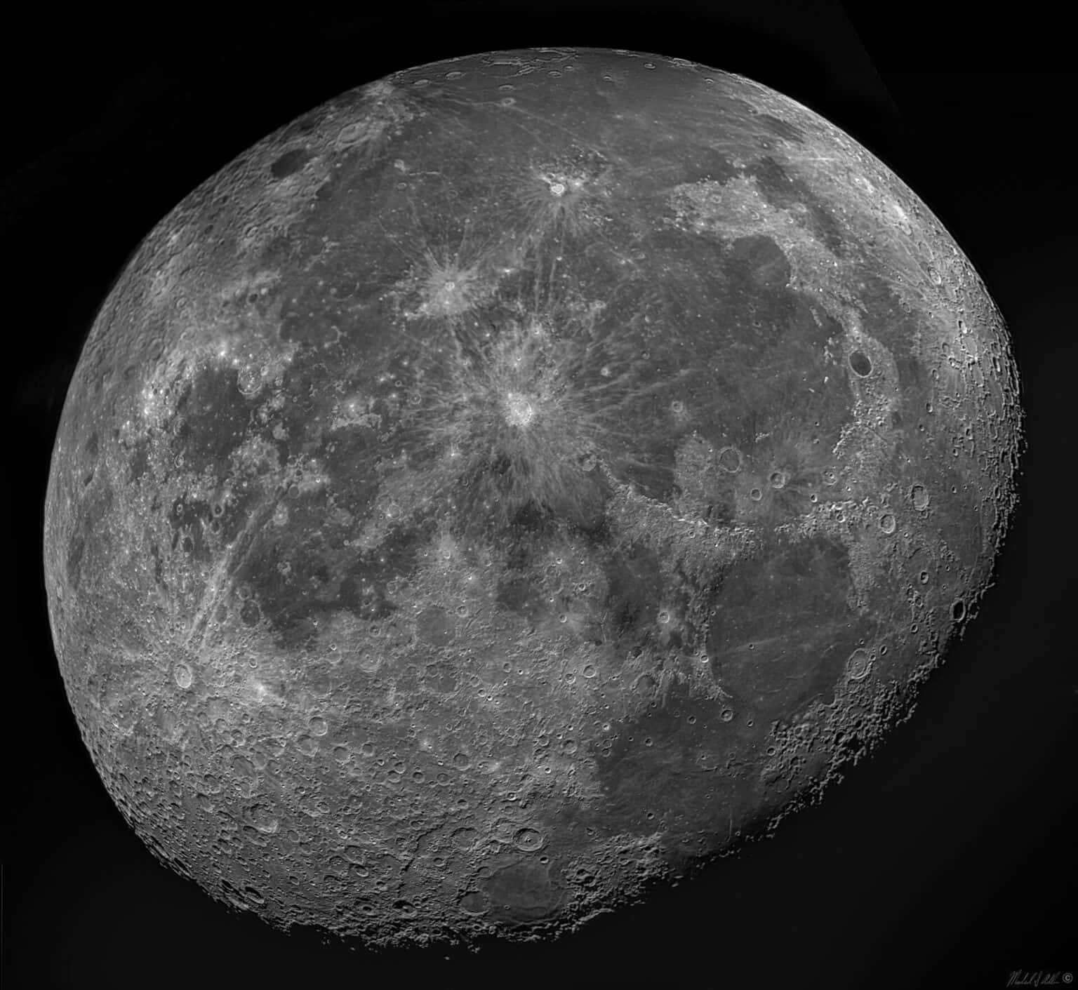 The Celestial Beauty Of The Waning Gibbous Moon Wallpaper
