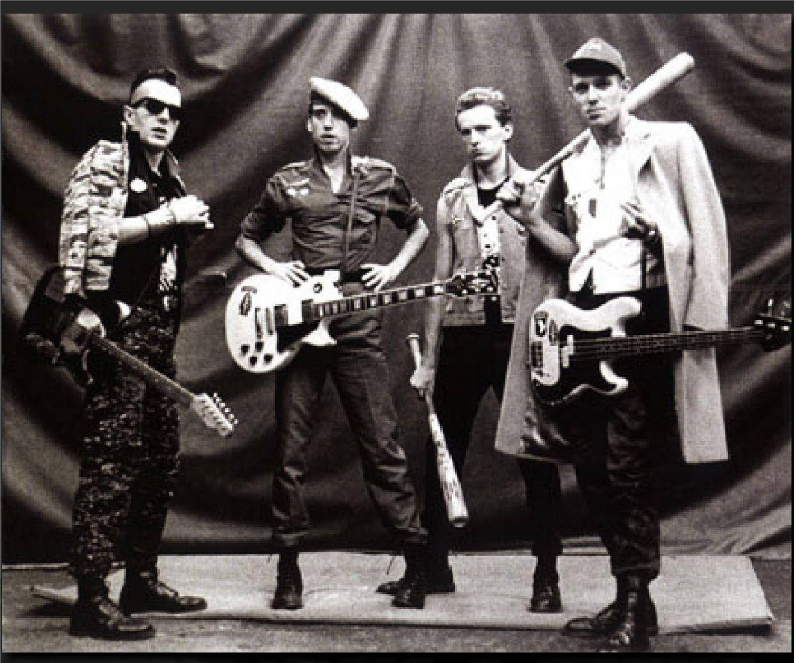 The Clash Performing At The Shea Stadium Wallpaper