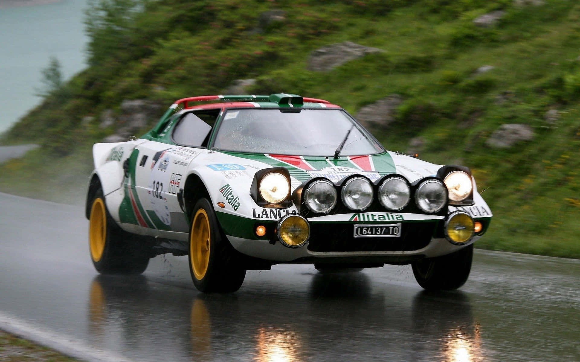 The Elegance Of Speed: Lancia Stratos On Road Wallpaper