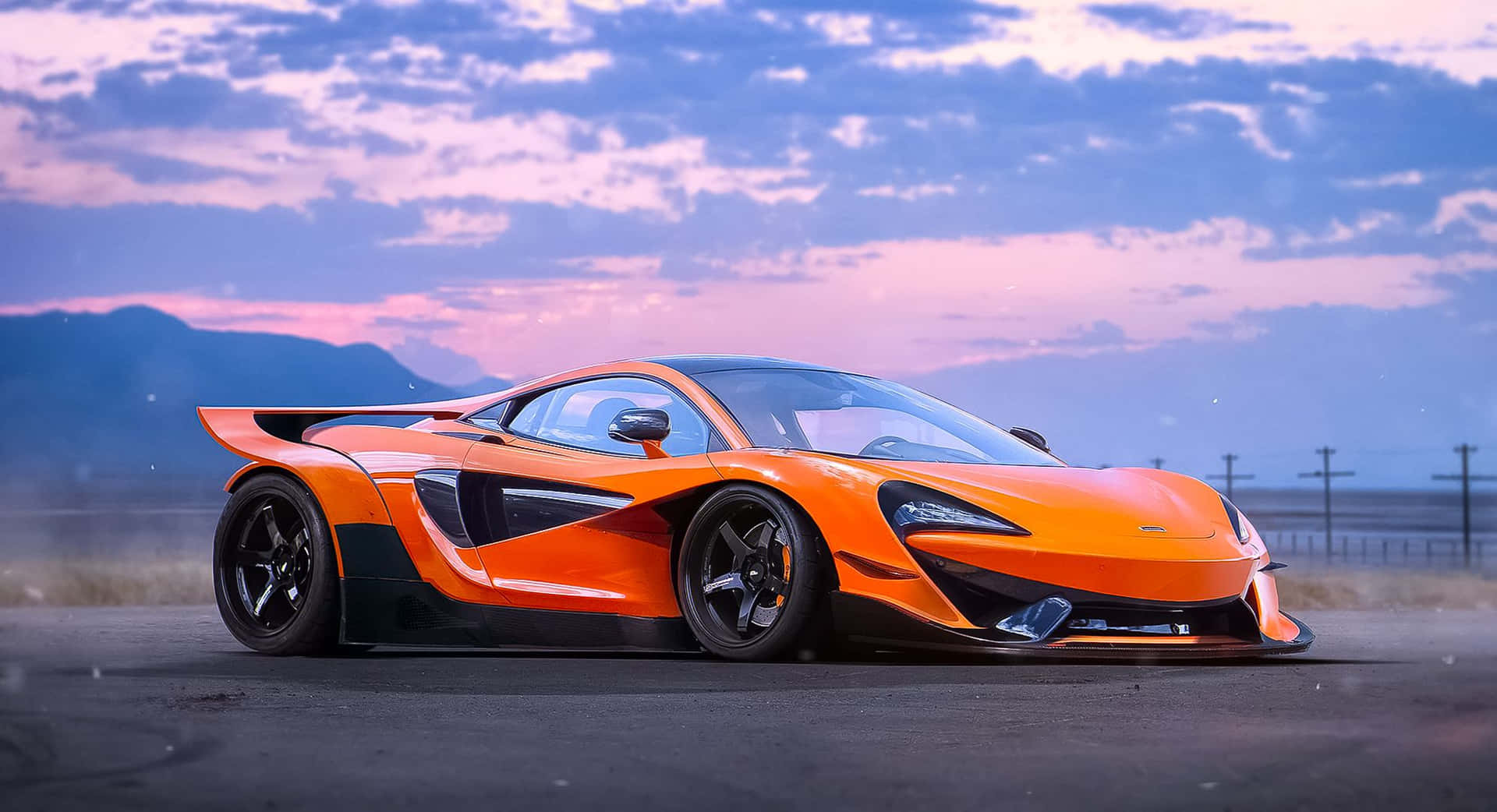 Den Elegante Mclaren 570s I Aksjon Bakgrunnsbildet