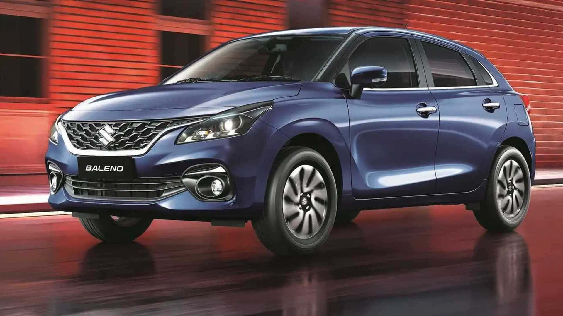 The Elegant Suzuki Baleno Gliding Smoothly On The Road Wallpaper