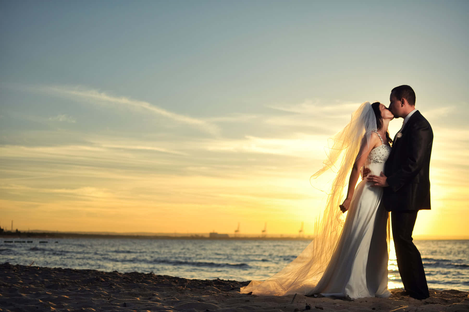 "the Epitome Of Romance: A Beach Wedding At Sunset" Wallpaper