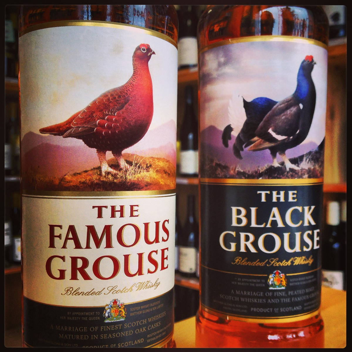 "Iconic Bottle of The Famous Grouse Black Grouse" Wallpaper
