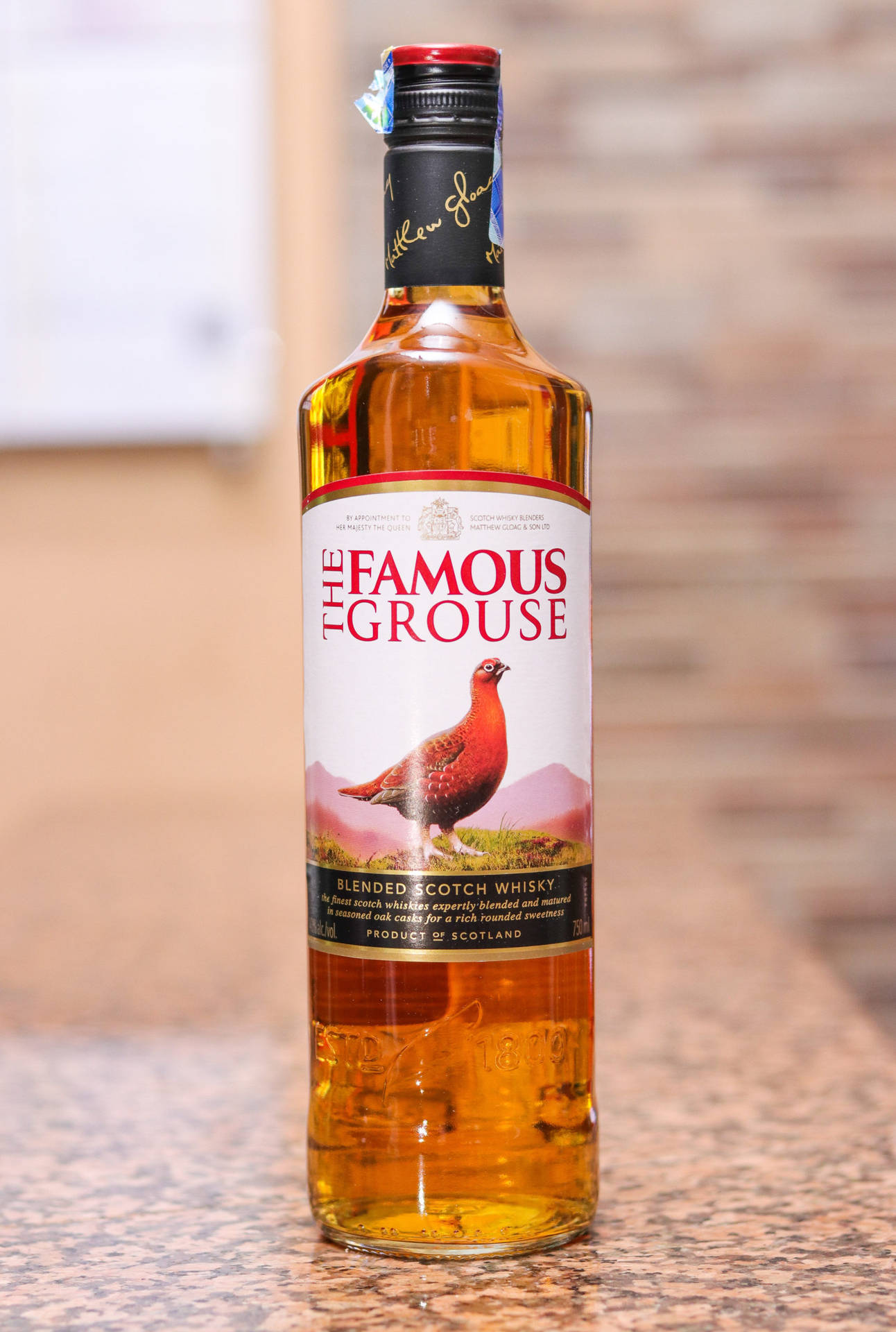 Labebida Alcohólica De Whisky The Famous Grouse. Fondo de pantalla