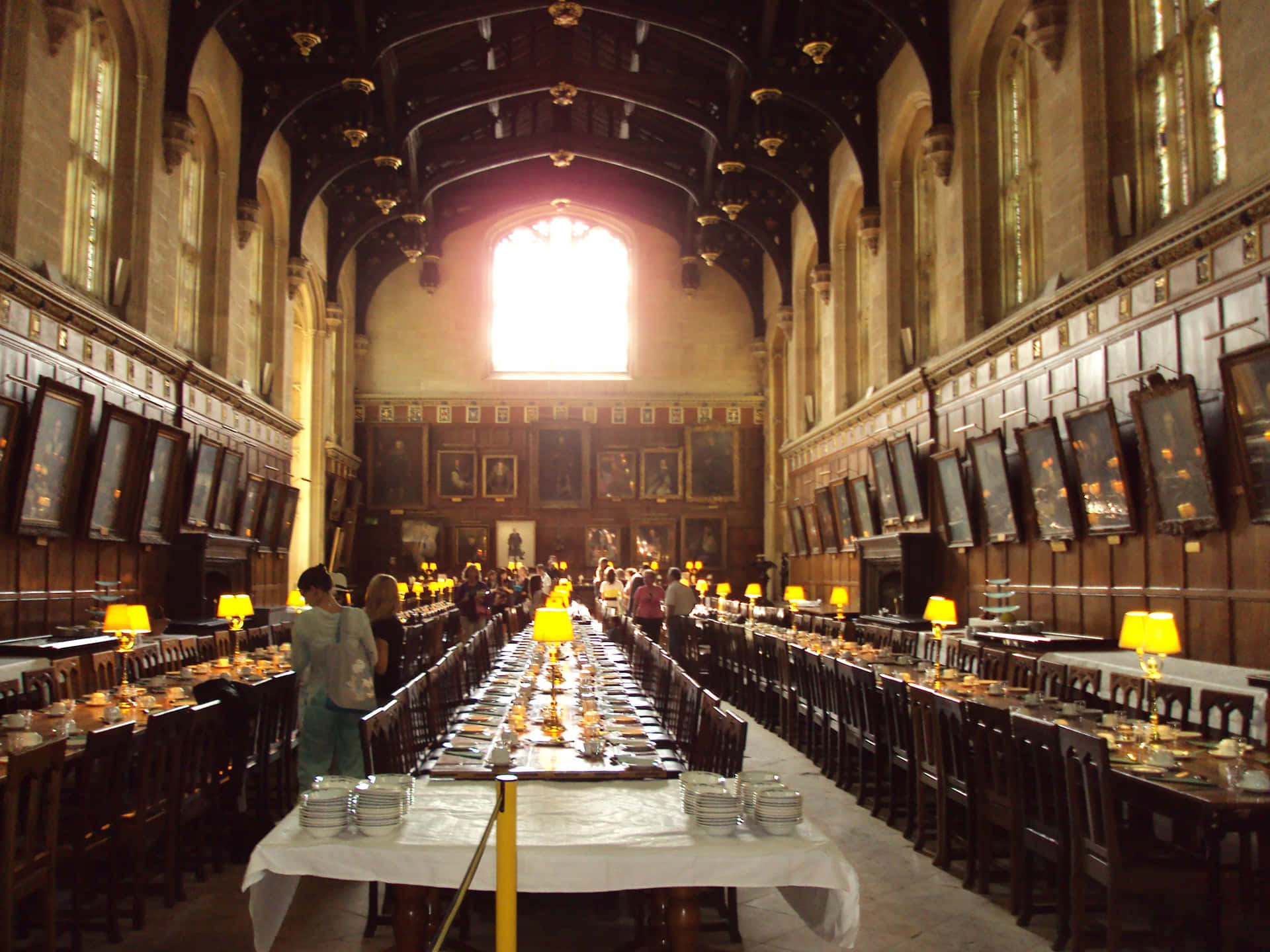 The iconic wizard-filled great hall of Hogwarts School of Witchcraft and Wizardry Wallpaper