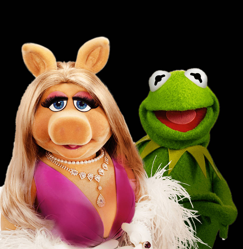 The Iconic Miss Piggy On A Pink Glamorous Background. Wallpaper