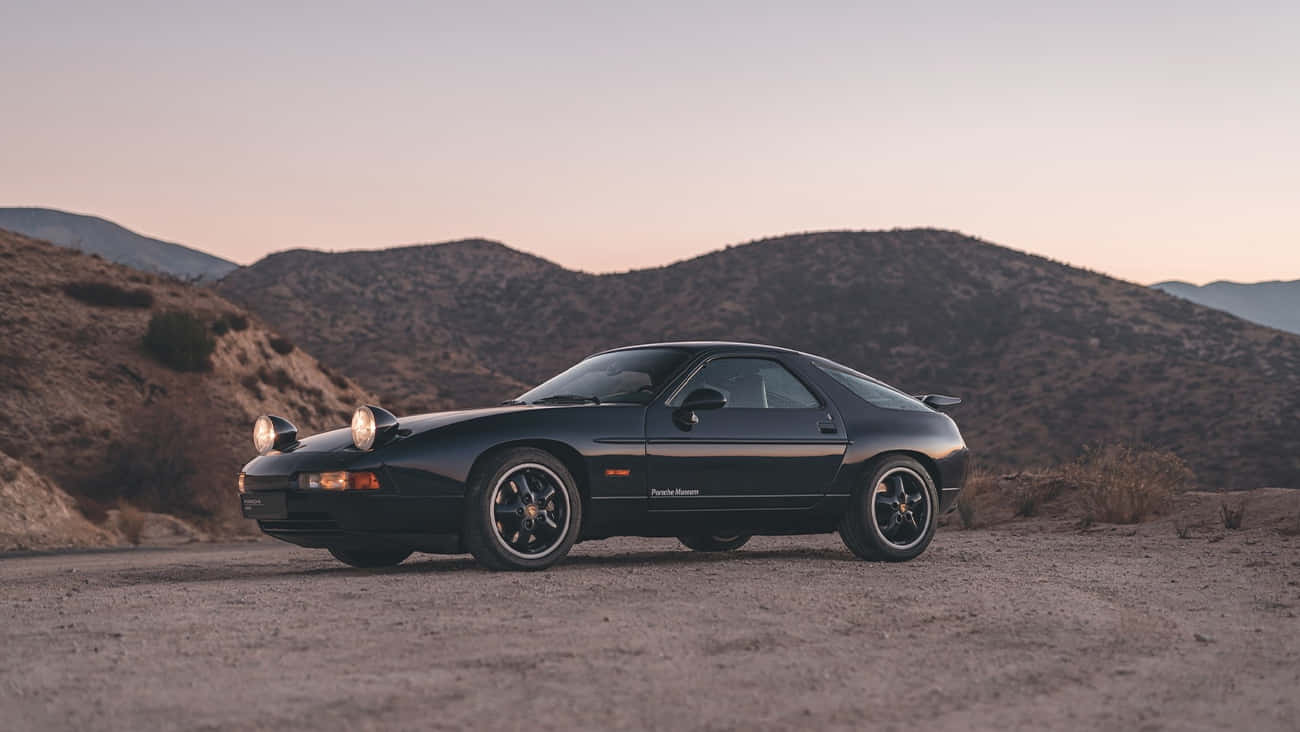 The Iconic Porsche 928 Showcasing Its Legendary Design And Power Wallpaper