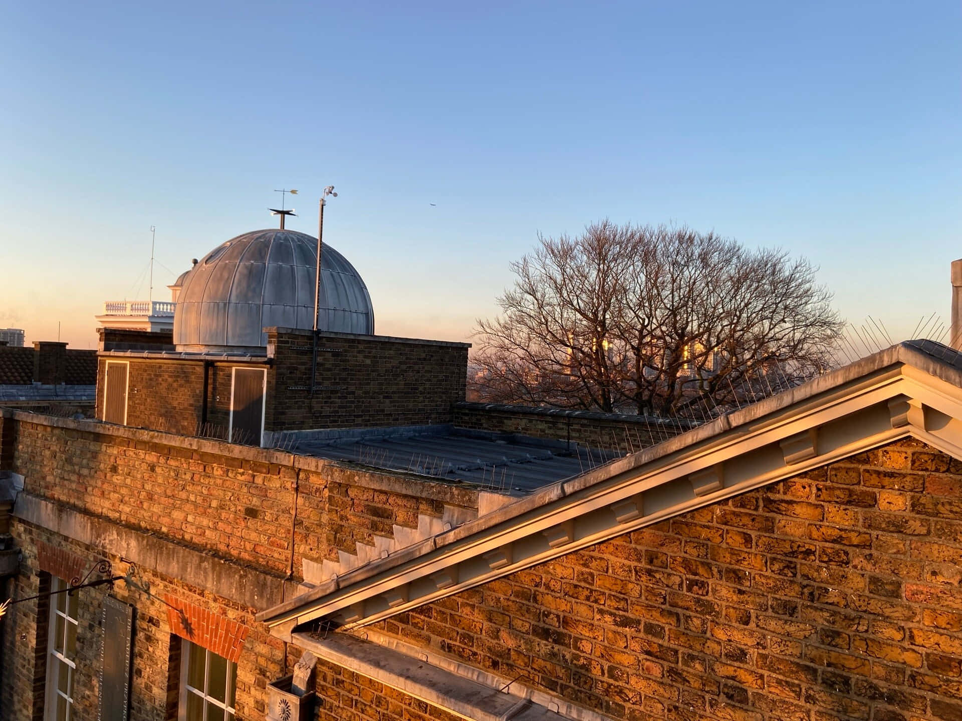The Iconic Royal Observatory Under A Star-filled Sky In Greenwich, London. Wallpaper
