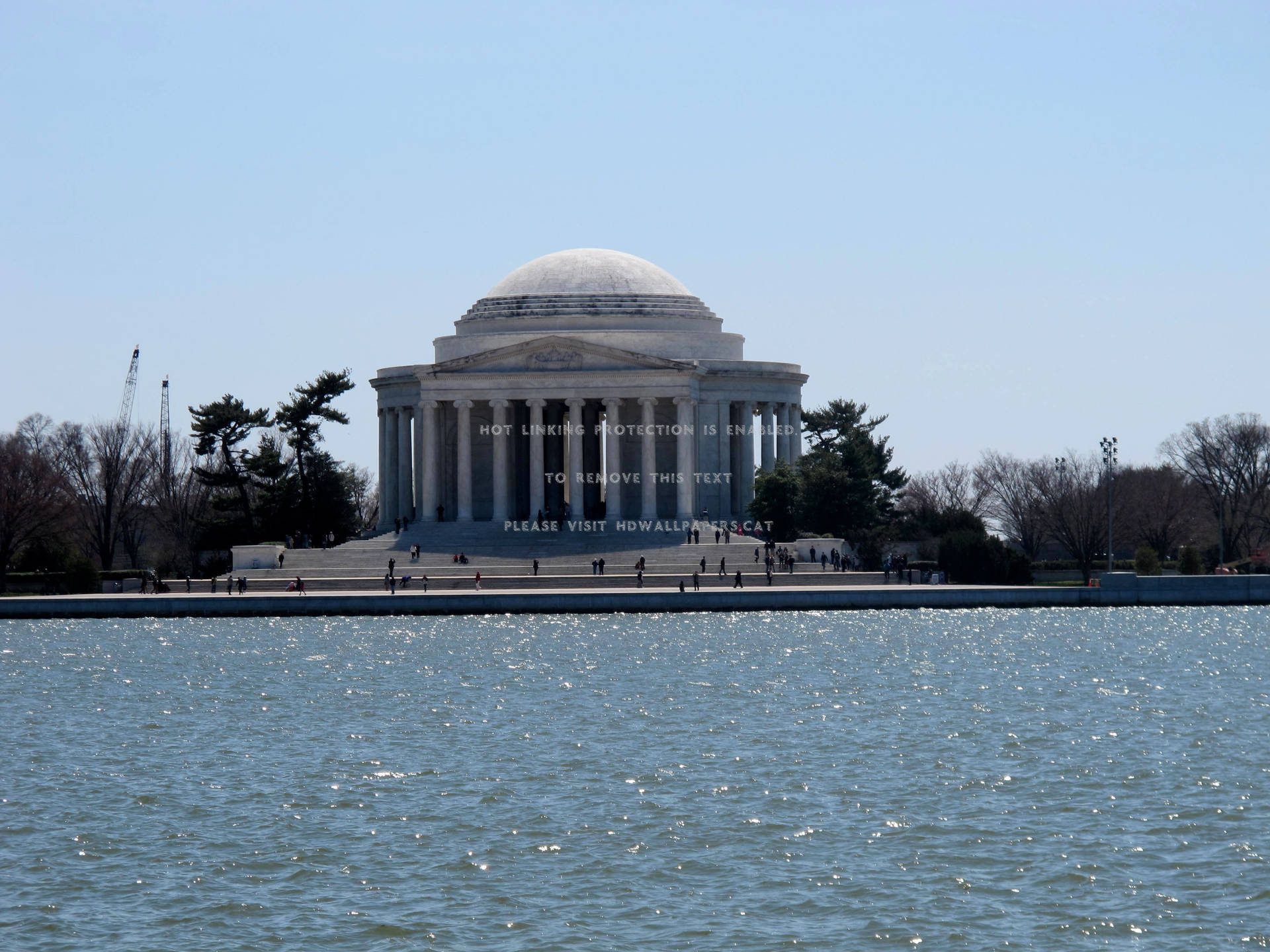 The Jefferson Memorial Standing Majestically Across The Tidal Basin Wallpaper