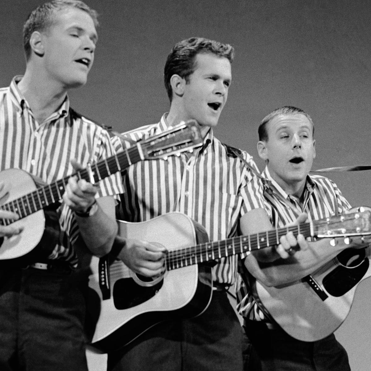 The Kingston Trio Performing in The Bell Telephone Hour Concert Series Wallpaper