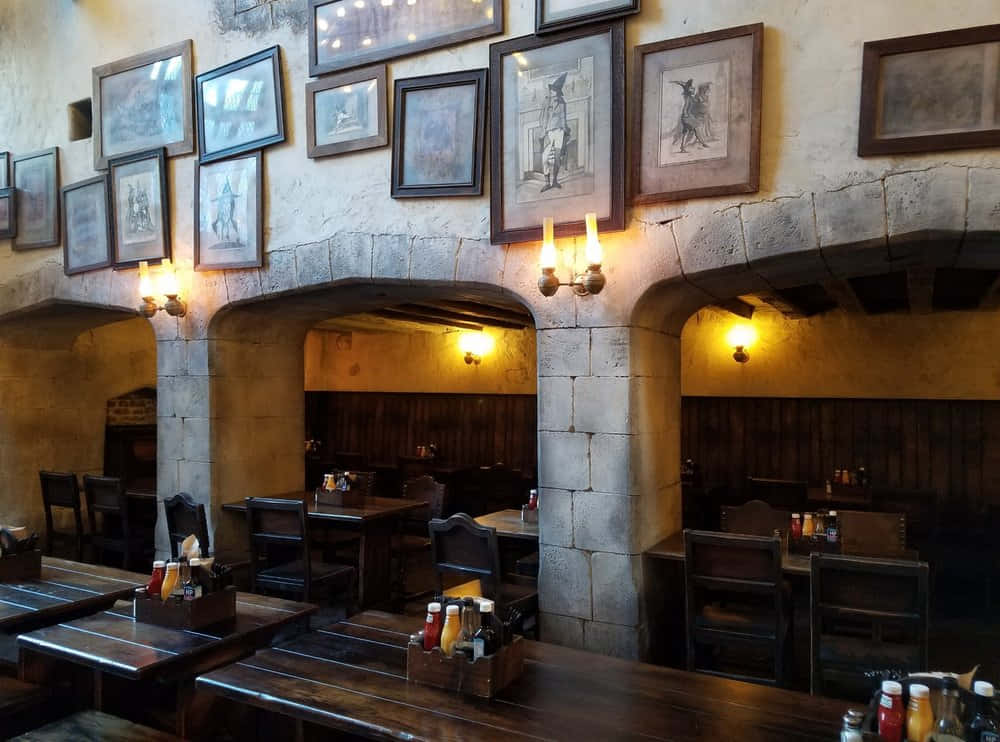 The Leaky Cauldron welcomes you to the Wizarding World Wallpaper
