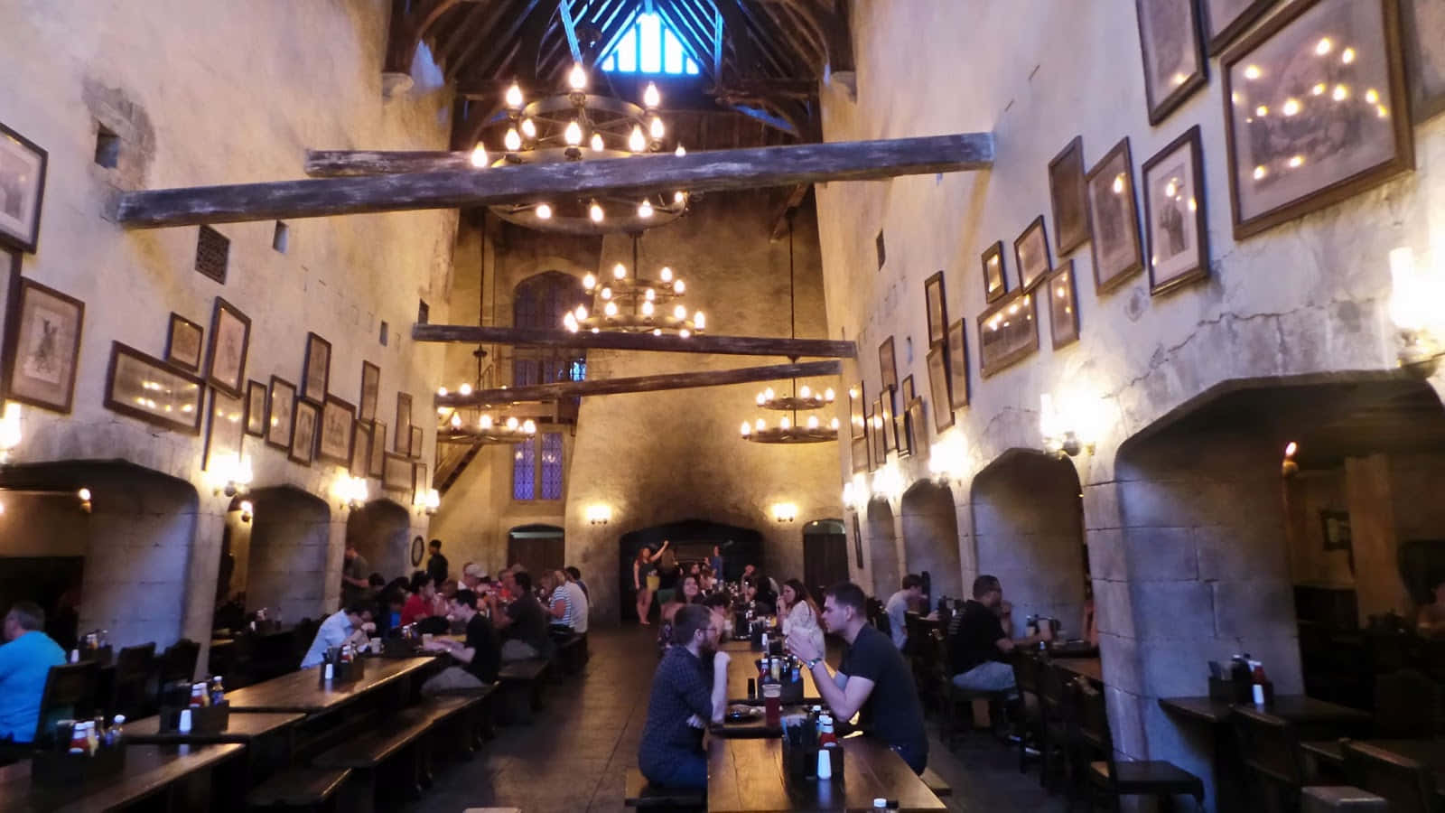 A bustling Leaky Cauldron pub in war-torn London Wallpaper