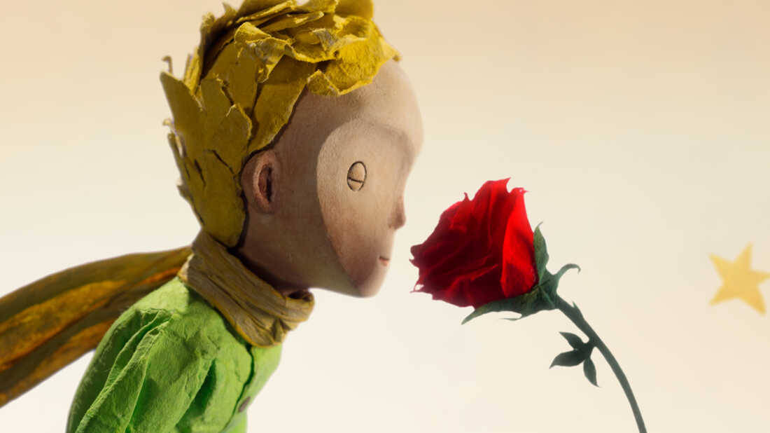 The Little Prince Smelling Rose Wallpaper