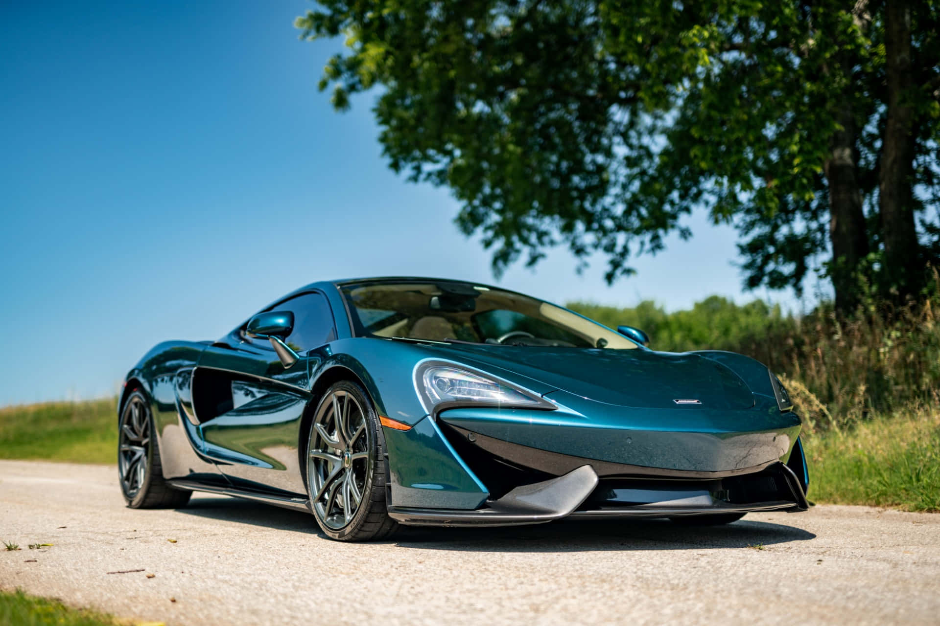 De Majestueuze Mclaren 570gt In Al Zijn Glorie Achtergrond