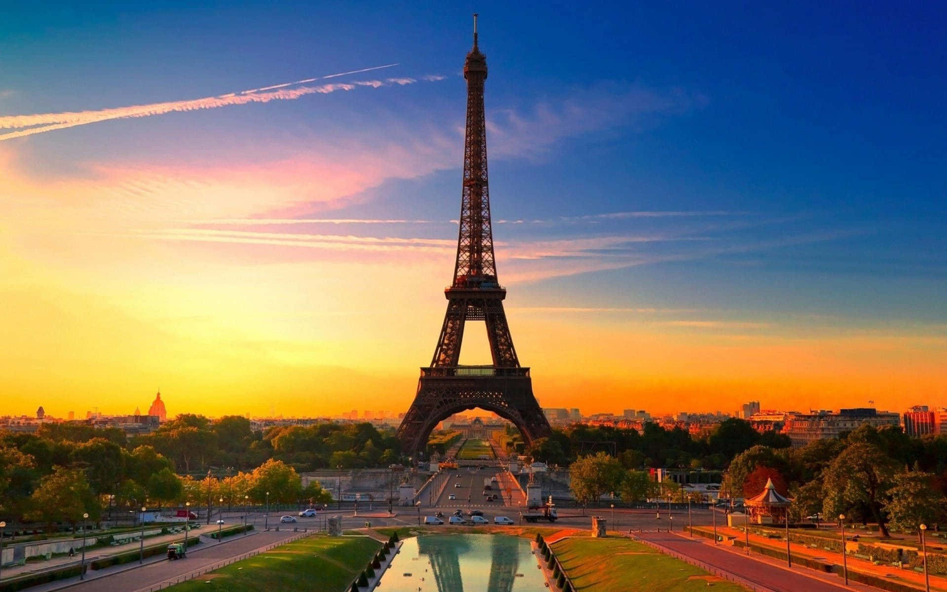 The Majestic View Of The Eiffel Tower At Dusk Wallpaper