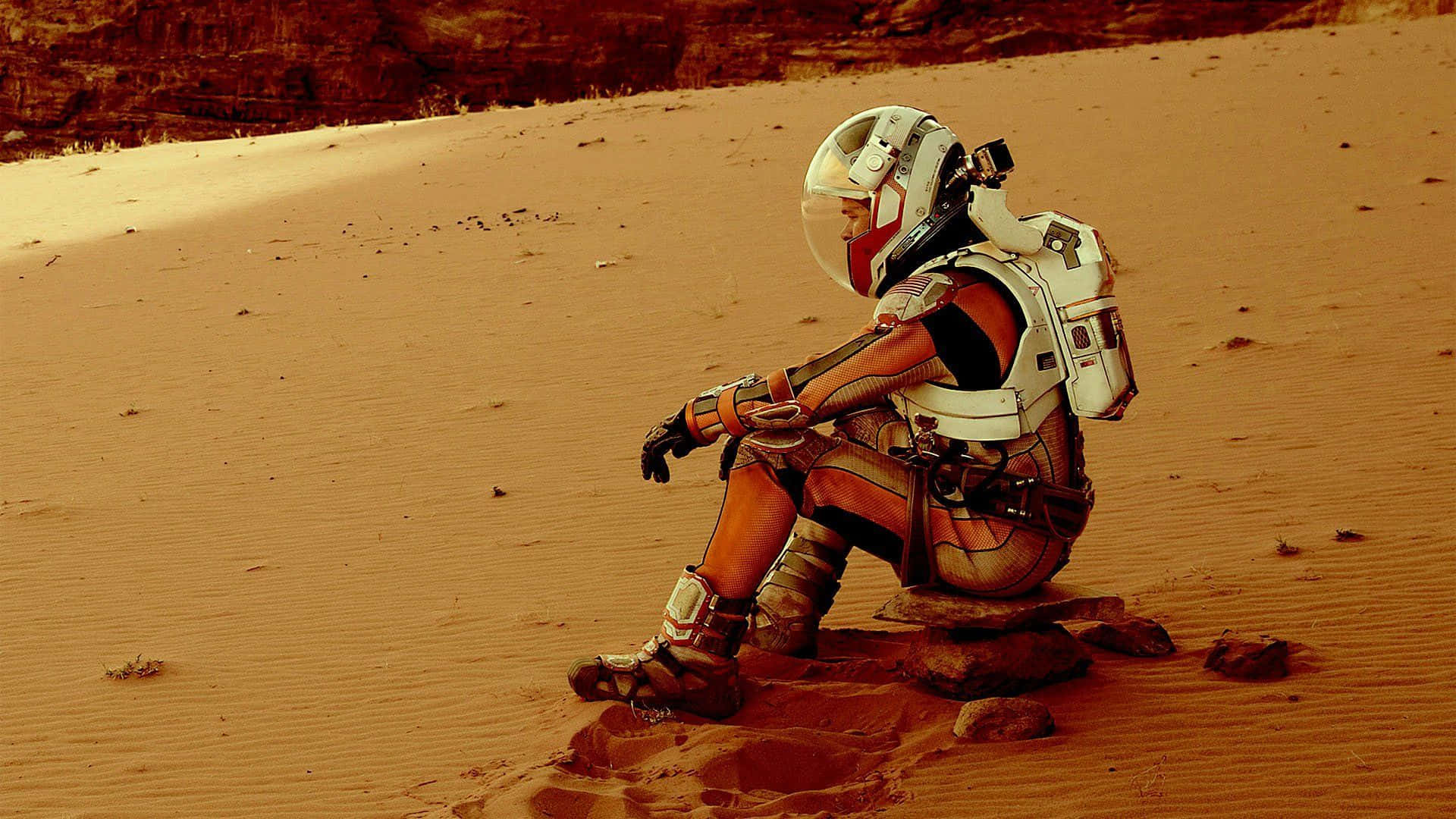 Astronaut exploring the Martian landscape Wallpaper